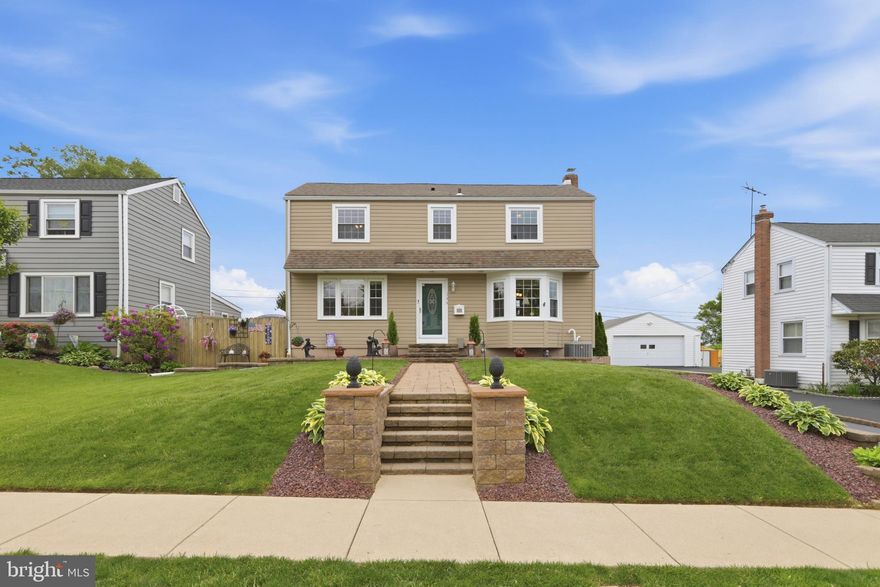 Welcome home!  This beautifully maintained and thoughtfully upgraded 3-bedroom, 2.5-bath home offering flexible living space, modern updates, and exceptional indoor/outdoor entertaining areas. With a spacious rear addition that can function as either a large family room or a desirable first-floor primary suite complete with an en-suite bath, this home offers versatility to fit a variety of lifestyles. Inside, you’ll find a warm and inviting layout featuring hardwood flooring throughout the living room, dining room, vestibule, landing, and all upstairs bedrooms, along with elegant Italian wood-grain porcelain flooring in the kitchen and rear flex space. The updated kitchen showcases custom cabinetry, granite countertops, and stainless steel appliances, creating a functional and stylish space for everyday living and entertaining. The rear addition provides outstanding flexibility and includes direct outdoor access with built-in blinds between the glass panes. Whether used as an oversized family room, guest suite, home office, or first-floor primary bedroom, the space is complemented by a beautifully appointed full bath featuring a curbless walk-in tiled shower with built-in seating and Moen fixtures. Additional interior highlights include three pocket doors on the main level, an enlarged upstairs bathroom with tiled surround walls, and a finished partial basement ideal for a playroom, gym, office, or additional living area. Step outside to enjoy the home’s exceptional exterior upgrades and custom hardscaping. Two rear paver patios create the perfect outdoor retreat, complete with a firepit, seating wall, bistro lighting, and illuminated columns. The professionally designed exterior also features automatically retractable patio awning, front paver accents with recessed lighting, a 10’ x 14’ shed with electric, and extensive outdoor lighting and outlets throughout the property. Major system updates provide peace of mind, including a newer roof with 30-year architectural shingles, upgraded 200-amp electrical service, replacement low-E argon gas windows, updated plumbing, a newer hot water heater, and well-maintained HVAC systems, including a rear mini-split system for the addition .As an added bonus, the sale includes professional architectural plans for a future attached garage. This is a rare opportunity to own a move-in ready home with flexible living options, quality upgrades, and beautifully designed indoor and outdoor spaces perfect for modern living. Schedule your showing now!