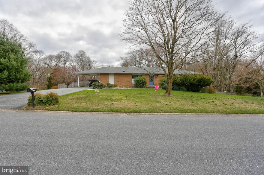 ​OFFER DEADLINE IS MONDAY APRIL 22ND 12 NOON Prepare to be amazed by this exquisite home, boasting a kitchen that dreams are made of! Completely renovated in 2017, the kitchen features a sprawling island perfect for gatherings, complemented by chic gray-blue and white cabinets with custom cabinetry and soft-close pulls. Adorned with stunning dark granite countertops and a tiled backsplash, this space is a culinary masterpiece. Equipped with all stainless steel appliances, including a huge farmhouse sink! Step onto the engineered hardwood flooring that spans the main level and one of the bedrooms, providing elegance and durability. All three bedrooms have been freshly painted and have ceiling fans! The ensuite primary shower has undergone a breathtaking transformation, adding to the luxury of this home. Convenience is key with the main floor laundry located in the mudroom off the kitchen, complete with a charming barn door. Additional features include a walk-in pantry, recessed lighting, built-in buffet for added storage and counter space, and custom lighting throughout. Cozy up by the wood-burning fireplace in the main living area, or venture outside to the private backyard oasis. Surrounded by trees, the backyard boasts a pool, hot tub, paver patio, fence, and built-in fire pit, perfect for entertaining or relaxation. The fully finished basement offers even more living space, complete with a large storage area and walk-out access. The basement was just updated in 2023 with carpet, ceiling, light fixtures, paint, and a bar with cast iron sink! Neutral paint tones flow seamlessly throughout the home, offering a blank canvas for personalization. With a new roof installed in 2020, this home is not only beautiful but also well-maintained and move-in ready. Some other recent updates are: furnace chimney liner in 2021, Murphy door to basement backroom, dryer and pedestals for washer and dryer, picture shelf in living room, security system, pool liner (2022), fence in backyard, vanity/sink in basement bathroom, water heater May 2023 and more!  Don't miss out on this true gem – it's time for new owners to make memories in this immaculate sanctuary!