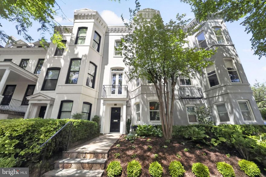 Set in the heart of Georgetown's East Village, this striking Victorian townhouse offers four bedrooms and three and a half bathrooms across a thoughtfully composed floor plan. Refined details define the residence throughout, from rich hardwood floors and custom built-ins to soaring ceilings that bring a generous sense of scale to every room. Sunlight pours through expansive windows on each level, illuminating the architectural craftsmanship that distinguishes this rare offering.

The main level is anchored by a gracious formal living room that opens seamlessly to a flagstone terrace, creating an effortless flow between indoor entertaining and private outdoor enjoyment. The elegant dining room transitions into a center-island chef's kitchen  with Viking, Bosch, and Sub-Zero appliances, where serious cooks will appreciate the quality of materials and the intelligent layout. A built-in banquette completes the space, offering a warm and inviting setting for casual meals and morning coffee.Enhancing both the main floor and back patio, a SONOS-ready speaker system provides convenient audio for everyday living and entertaining.

The second floor delivers a second family room of considerable distinction, complete with handsome built-ins and a fireplace that lends quiet warmth to evenings spent at home. The primary suite occupies its own private wing of this level, featuring high ceilings, two generous walk-in closets, and a spacious primary bathroom appointed with a soaking tub, double vanities, and a separate shower, all designed to provide a true retreat from the day.

The top floor offers three additional well-proportioned bedrooms and two full bathrooms, providing ample accommodations for family and guests with both privacy and comfort in mind. The recently updated lower level adds further versatility, featuring a large family room ideal for media, recreation, or a quiet study, along with a convenient powder room.

This is a rare opportunity to own a turnkey Victorian in one of Georgetown's most coveted enclaves, just moments from the boutiques, restaurants, and cobblestone charm that define the neighborhood. Here, historic character and modern livability meet in equal measure, offering a residence that honors its Georgetown heritage.