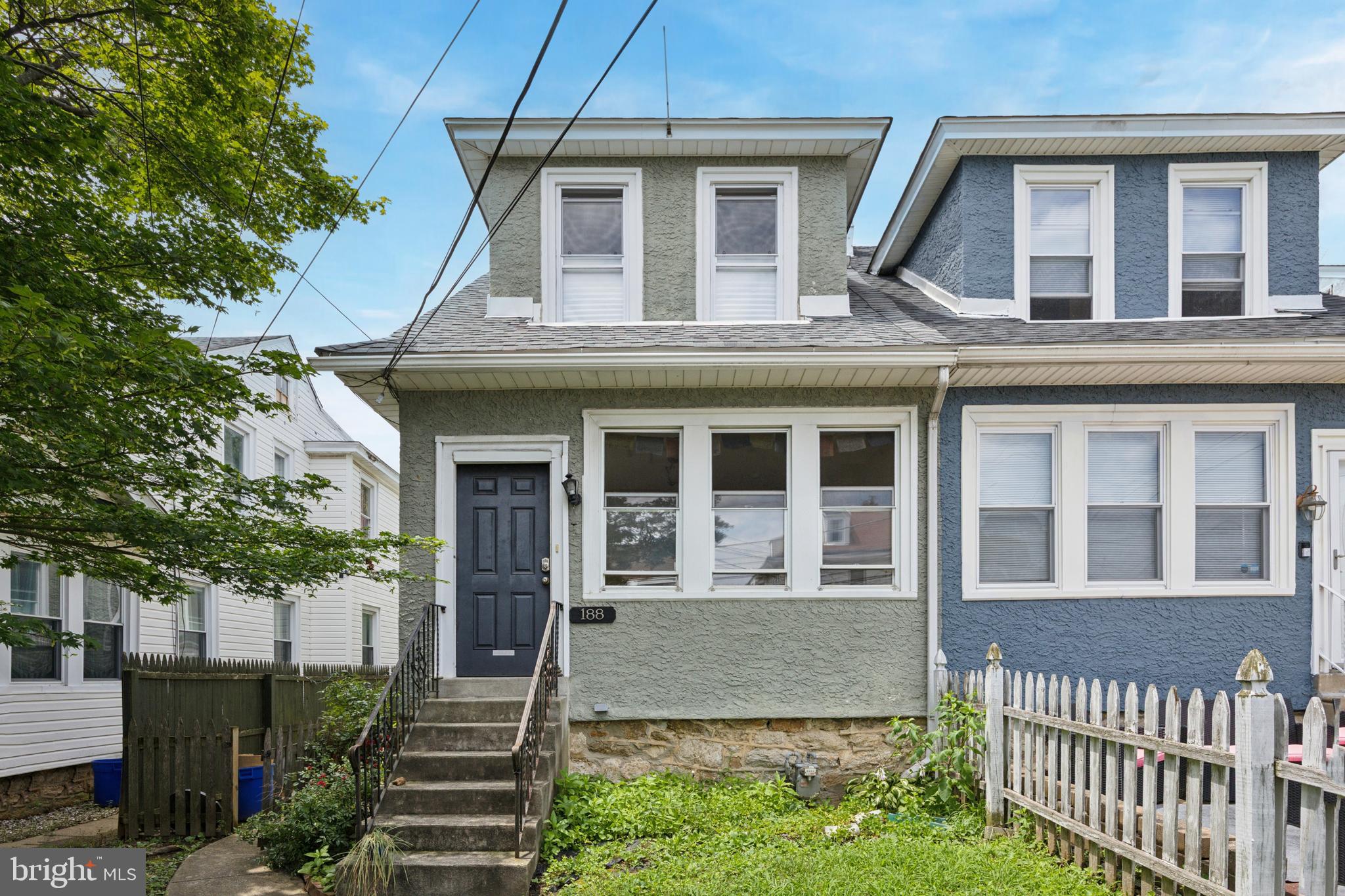 Welcome to 188 Burmont Road, a charming 3-bedroom, 1.5-bath twin home in the heart of Drexel Hill, available for immediate occupancy. Ideally located near schools, shopping, and major routes, this home offers both convenience and comfort.
Step inside to a cozy living room featuring a convenient powder room, followed by a spacious family room with beautiful hardwood floors and a wood-burning fireplace—perfect for relaxing or entertaining. The formal dining room also boasts hardwood flooring and leads into a bright, eat-in kitchen complete with a stainless steel appliance package, including a gas stove, space-saving microwave, dishwasher, and refrigerator. A double-bowl sink and tile flooring add function and style.
Upstairs, you'll find a generously sized primary bedroom along with two additional well-proportioned bedrooms. The hall bathroom includes tile flooring and a tub/shower combination.
The full basement offers laundry facilities, including a washer, dryer, and utility sink, with plenty of room for storage. Enjoy the private backyard—ideal for outdoor activities or quiet relaxation.
This home is being sold in as-is condition. Buyer is responsible for the Use and Occupancy certificate and any required repairs.