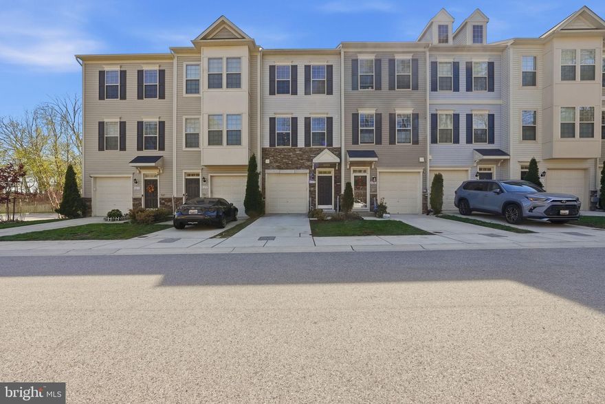 Welcome to 8219 Hollow Court, a modern garage townhome situated in the heart of the Baltimore-Washington corridor’s most strategic residential enclave. Built in 2019 and meticulously maintained in its original contemporary condition, this three-level residence offers the perfect balance of style, comfort, and logistical convenience. 

The entry level features a versatile family room that serves as an ideal home office or guest suite, complete with a full bathroom and internal access to the one-car garage. The main level is a study in open-concept design, where a gourmet kitchen with granite countertops, white cabinetry, and stainless steel appliances flows seamlessly into the dining and living areas. High ceilings and recessed lighting enhance the sense of space, while the rear deck provides a private outdoor retreat backing to open space. Upstairs, the dual primary suite configuration ensures privacy and luxury for all residents, with each bedroom boasting its own en-suite bathroom. 

Located just minutes from Fort Meade, NSA, and BWI, this home is the ultimate hub for the modern professional.

Seller does have a VA Assumable loan at 3.25% with a balance of $376K remaining.