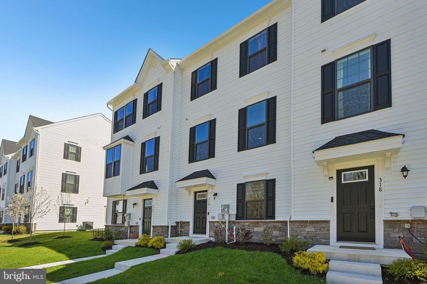 Welcome to this beautifully maintained, like-new 3-bedroom, 2.5-bath townhome in the desirable Exton Walk community—built in 2024 and offering the space of single-family living with the convenience of a townhome. Filled with abundant natural light, this home features an open layout perfect for everyday living and entertaining.

The entry level offers a flexible living space ideal for a home office, gym, or additional living area, along with access to the rear-entry garage.

Upstairs, the main level showcases a bright open floor plan with a spacious living room flowing into the eat-in kitchen and dining area. The kitchen boasts beautiful cabinetry and a large center island, making it perfect for gathering and entertaining. Step out from the dining area onto the Trex deck—ideal for relaxing or enjoying outdoor time. A convenient half bath completes this level.

Up a flight of stairs, the upper level features three bedrooms, two full baths, and a conveniently located second-floor laundry room. Generous closets are found in all bedrooms. The owner’s suite is a private retreat accented with a tray ceiling, walk-in closet, and en-suite bathroom. Two additional well-sized bedrooms share a full hall bath.

Enjoy the luxury of a home that feels brand new without the wait—move right in and add your personal touches. Ideally located close to shopping, dining, and a variety of amenities. Mortgage savings may be available for buyers of this listing.