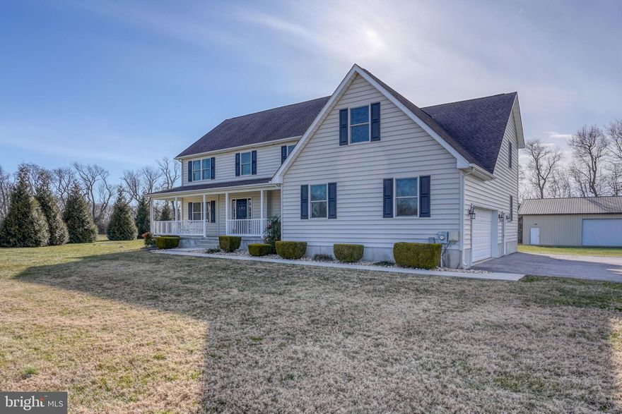 Welcome to this beautiful Custom Built colonial style home with a large covered front porch, in a GREAT location, rural but only minutes from town, nestled on a private culdesac, where privacy is abundant, neighboring some very esquisite homes in the well established private community and No HOA. This is a rare opportunity to live in a great home/location like this for this price.  Don't pay New Construction Prices, deal with delays, extended or unknown closing date, and have to pay and build a Detached Garage after closing and wait for grass to grow.  We are weeks away from spring and you can be ready to enjoy this home and yard immediately.  Do you know those little design wish lists you say you will make in your next home... an extended garage, bathroom located near the garage and back door for quick convenience, a main floor laundry and bedroom, oversized driveway, detached garage for your workshop, boat, ATV's, etc?  Well this home has it!!!   The detached garage also helped make memories in working on the High School Home Coming Float.   Designed as a 5 Bed Room home with 3.5 Baths, with a main floor bedroom and partially finished basement with a bilco walk-out.  Each room is spacious and it's a great floor plan. The Glacier Bay fireplace insert is wood burning and can be removed to use as a standalone fireplace. Kitchen and Family Room are open with a large Breakfast Room in the middle, with a door to the backyard.  Large Kitchen has lots of counter space and is great for all your cooking and baking needs, and the large island and bar stool seating is great for hosting gatherings and buffet style meals.  The Laundry Room is abundant in size, situated off the garage and perfect to kick off shoes, coats, winter wear, and serve as "Grand Central Station" for book bags, briefcase grab and go each morning, as well as the laundry needs and it has a door to backyard.  The Powder Room is adjacent to Kitchen, Laundry and Garage is the Perfect location in this floor plan.  The Family Room has a cozy fireplace and is great spot for everyone to relax.  The Dining Room previously used as a play room, is spacious for gatherings, formal dinners or an office.  The UPPER FLOOR hosts the Primary Bedroom Suite (full bath with dual sinks and walk-in closet) located separate from the other Bedrms; A galley style hallway hosts 2 other Full Baths each with dual sinks and Tub/Shower, which was great when their 2-sets of twins were all getting ready for school at the same time, and the other 4 Bedrooms and a Walk-in Bonus Room used for storage or would make an awesome walk-in closet or quiet office.   There is also a pull down stairs to the attic with partially flooring and could be used for storage if desired.  Partially finished BASEMENT offers plenty of uses for the space, includes the custom bar and Vintage Pool Table; currently used as a Bar / Pool Room, Fitness Room and a another relax area to play ping pong.  HOME GARAGE: Oversized 2-car garage plus a separate bump out area for seperate storage away from the auto's and has a person door for easy access and not to open the garage doors ever time. DETACHED GARAGE: Detached Garage 40x60, 12ft Ceiling Height, concrete floor, with 3 garage doors and a person door, separate electric panel and water pump located near the door. This was a great multi-use space for workshop, boat, crabbing items, lawn mower, ATV's, bikes, scooters, trailers, and worked out great for working on the High School Home Coming Float too. DRIVEWAY: oversized to the home/garage and oversized for parking and access to the Detached Garage. Great for hosting gatherings and parking needs. OTHER: Dual Zoned for Main and Upper Floor, with Unit 1 in Basement and Unit 2 in Attic.  Septic is located on the Left Side of home so if you want to build a pool, patio, etc, you have plenty of room in the backyard.  The 500 gallon propane tank located front left side near front porch. Home/Lot size and Taxes provided by County.