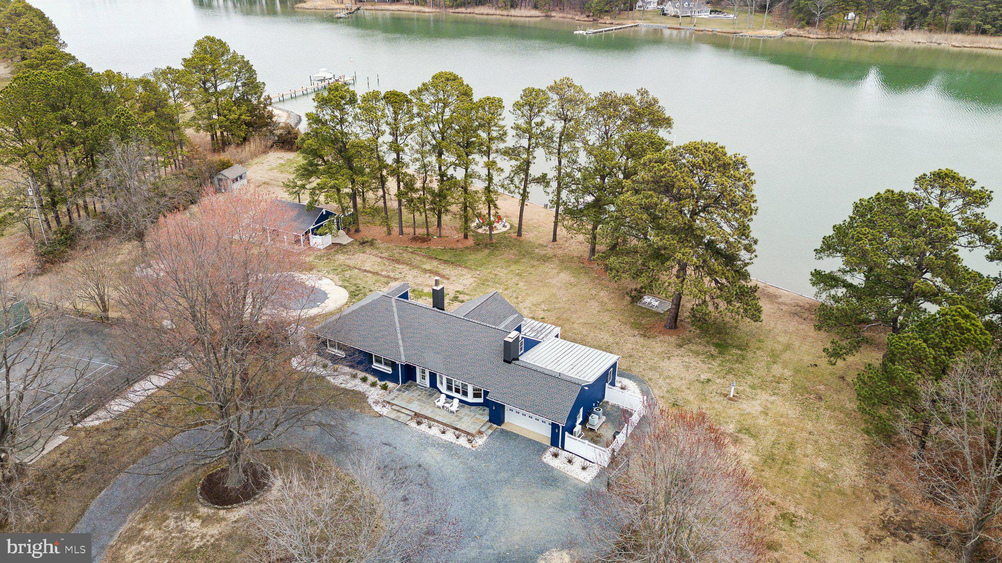 Your own private resort in St Michael’s Maryland!! This one has it all and then some! Dock with boat lift, swimming pool, tennis court, 4 to 5 bedrooms, beautiful baths, hardwood floors. Within the last five years the owners have put on a new roof and dormers, redone the kitchen, encapsulated the crawlspace, installed a boat lift, replaced the boiler and painted the exterior. Don’t miss your chance to see this amazing property before it sells.