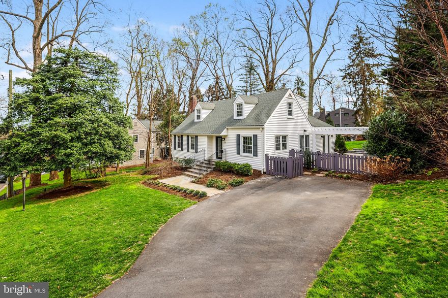 The One You’ve Been Waiting For!

Welcome to this beautifully updated and expanded Cape Cod, perfectly situated on a stunning corner lot in the heart of Falls Church City. Nestled within the highly sought-after Falls Church City School District, this home is just a short walk (½ mile) to Oak Street Elementary and less than two miles from Mary Ellen Henderson Middle School and Meridian High School.

Step inside to discover an inviting open kitchen featuring elegant Carrara marble countertops, 42" cabinetry, and stainless steel appliances, all seamlessly flowing into a spacious family room addition. With soaring cathedral ceilings, a cozy fireplace framed by built-in bookshelves, and expansive windows that bathe the space in natural light, this room is the heart of the home. Beautiful hardwood floors extend throughout the main and upper levels, adding warmth and charm.

The main-level primary suite offers a luxurious retreat, complete with a renovated en-suite bath featuring a Carrara marble double-sink vanity, a large soaking tub, and a spa-like shower with a frameless glass enclosure. Upstairs, two generously sized bedrooms share a renovated hall bath, showcasing the same elegant marble counters, updated mirror, and modern lighting.

The finished lower level provides additional living space, complete with a third full bath—ideal for game nights, a teen hangout, or hosting overnight guests. Outside, enjoy a beautifully landscaped corner lot with a spacious side patio adorned with an arbor, as well as a rear patio overlooking a large, flat yard—perfect for relaxing or entertaining.

Ideally located, this home is just blocks from Oak Street Elementary and moments away from Falls Church’s vibrant shopping, dining, and parks. Enjoy easy access to the W&OD paved biking and walking trail (less than a mile away), and convenient proximity to both East Falls Church and West Falls Church Metro stations (just 2 miles). Commuting is a breeze with quick access to Route 66, Route 50, Route 7, I-495, and Route 29—offering a short trip to Washington, D.C., and the Pentagon.

Don’t miss this rare opportunity—schedule your private tour today!