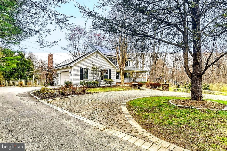 Offering 3,776 total square feet, this meticulously renovated home (2023) with extensive owner upgrades to interior and exterior since delivers the perfect blend of style, comfort, and setting. This custom built home sits on a truly special lot, the grounds feature lush gardens, peach trees, koi ponds, and a private basketball court—creating a one-of-a-kind outdoor retreat, while the mix of shade and sunlight gives the feel of a peaceful, sun-drenched escape in the woods. Inside, you’ll find a stunning chef’s kitchen, an inviting family room with vaulted ceilings and a wood-burning fireplace, and a luxurious primary suite retreat with a spacious walk-in closet and spa-like bath. All bathrooms have been tastefully renovated, and hardwood floors add warmth throughout. The walk-out lower level offers a wet bar, full bath, and flexible space ideal for an in-law suite or recreation area. Additional highlights include a newly installed Solar Panels and a Tesla charger in the two-car garage—don’t miss this one, it won’t last.