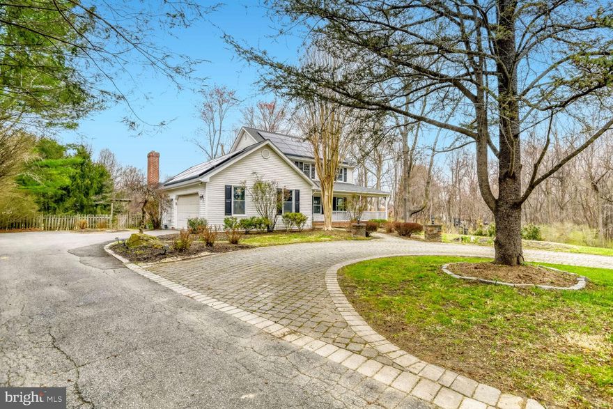 Offering 3,776 total square feet, this meticulously renovated home (2023) with extensive owner upgrades to interior and exterior since delivers the perfect blend of style, comfort, and setting. This custom built home sits on a truly special lot, the grounds feature lush gardens, peach trees, koi ponds, and a private basketball court—creating a one-of-a-kind outdoor retreat, while the mix of shade and sunlight gives the feel of a peaceful, sun-drenched escape in the woods. Inside, you’ll find a stunning chef’s kitchen, an inviting family room with vaulted ceilings and a wood-burning fireplace, and a luxurious primary suite retreat with a spacious walk-in closet and spa-like bath. All bathrooms have been tastefully renovated, and hardwood floors add warmth throughout. The walk-out lower level offers a wet bar, full bath, and flexible space ideal for an in-law suite or recreation area. Additional highlights include a newly installed Solar Panels and a Tesla charger in the two-car garage—don’t miss this one, it won’t last.