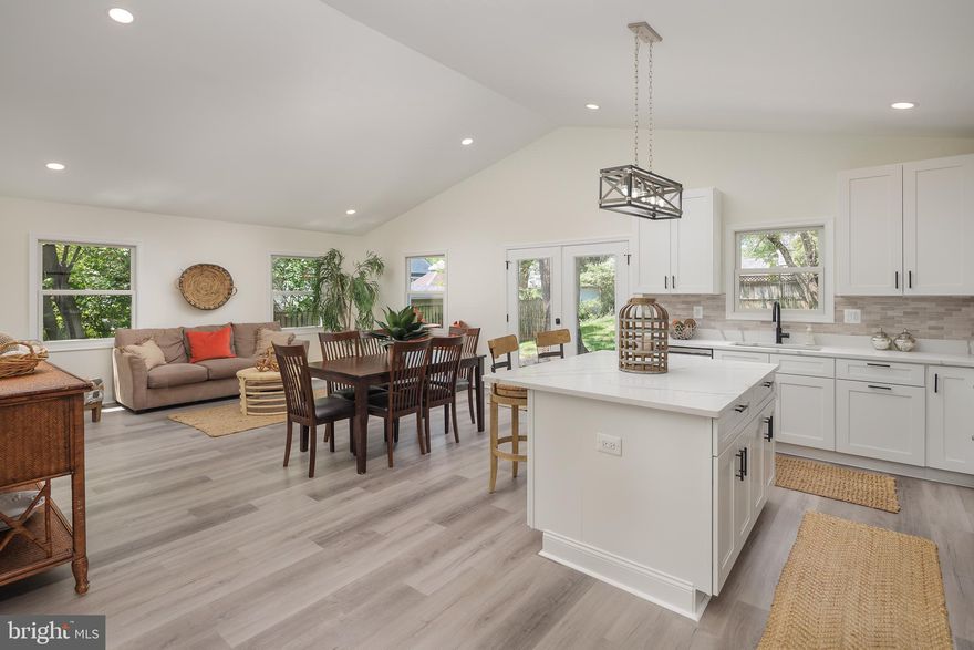 UNBELIEVABLE TRANSFORMATION OF A FALLS CHURCH CAPE COD INTO A STUNNING 2650 SF COLONIAL WITH A FULL SECOND FLOOR, BUT THAT'S NOT ALL....THERE IS ALSO A 29X18 ADDITION OFF THE REAR OF THE HOME WITH SOARING CEILINGS. THAT ADDITION HAS A HUGE KITCHEN WITH AN ISLAND THAT LEADS TO AN AWESOME FAMILY ROOM * NICE STONE PATIO OFF REAR OF HOME OPENS TO A MASSIVE PRIVATE BACK YARD   * EXPANDED UPPER LEVEL HAS 3BRs & 2 BATHS PLUS A LAUNDRY ROOM AND A DBL HALL CLOSET * MN LVL HAS A 4TH & 5TH BR, WOW! * LUXURY VINYL PLANKING THROUGHOUT WITH CERAMIC TILE IN ALL 4 FULL BATHS * FULLY FINISHED LOWER LVL HAS A FULL BATH, TOO * GORGEOUS LAWN AND COVERED FRONT PORCH CREATES FABULOUS CURB APPEAL!!