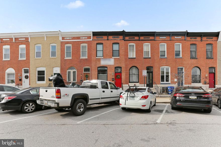 GORGEOUS 14 FT WIDE CHAP RENOVATION LOCATED ON SOUGHT-AFTER BLOCK IN PATTERSON PARK. SUPER LOW TAXES - ROUGHLY 7 YEARS REMAINING ON TAX CREDIT. GLISTENING HARDWOODS CASCADE THROUGHOUT. ENJOY CUSTOM WHITE CABINETRY, UPGRADED TRIM AND PAINT PACKAGE, IMPORTED TILE, QUARTZ COUNTERTOPS, SS APPLIANCES IN DESIGNER CHEF'S KITCHEN WITH OVERSIZED ISLAND. TONS OF NATURAL LIGHT. FINISHED LOWER LEVEL WITH GIGANTIC SECONDARY GREAT ROOM. HIGH CEILINGS. TONS OF STORAGE. WALK-IN SHOWERS. WALK-IN CLOSETS. EXPOSED BRICK. COFFERED CEILINGS. CUSTOM SHUTTER BLINDS. SPACIOUS 3 BEDROOMS WITH 3.5 BATHROOMS. EXPANSIVE ROOF DECK FOR ENTERTAINING WITH INTERNAL ACCESS. ROUGHLY 7 YEARS ON CHAP TAX CREDIT REMAIN. CLOSE PROXIMITY TO RETAIL SHOPPING, LOCAL DINING, PATTERSON PARK, AND ALL MAJOR HIGHWAYS. SCHEDULE A PRIVATE TOUR TODAY.