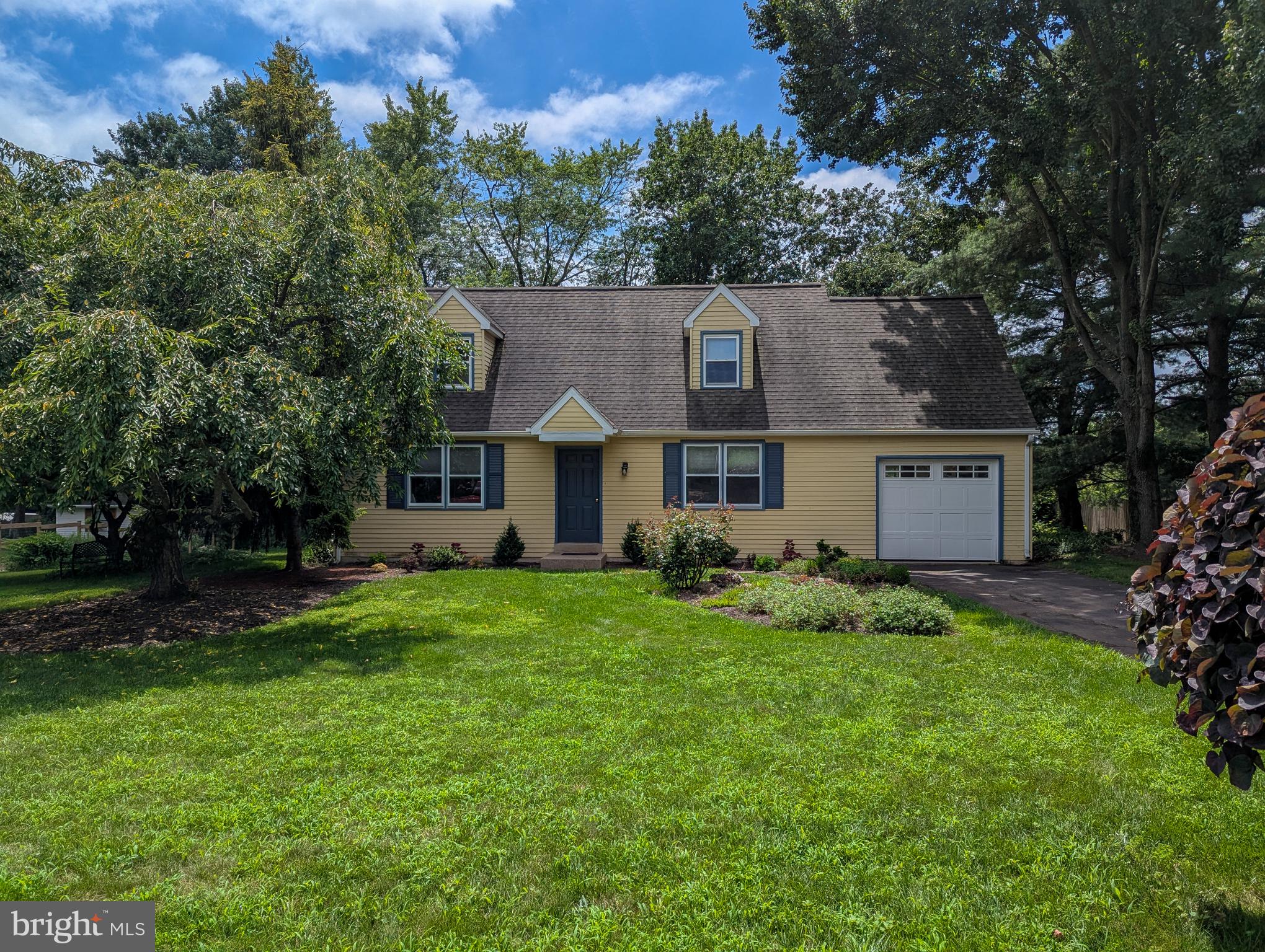 Welcome to 664 Harper Lane – A Charming Cape Cod in Sought-After Lower Salford Township. Nestled on a beautifully landscaped .42-acre lot, this delightful 4-bedroom, 2-bathroom Cape Cod offers the perfect blend of indoor comfort and outdoor enjoyment in a highly desirable neighborhood. Surrounded by lush ornamental trees and well-maintained shrubs, the expansive yard provides a picturesque backdrop for alfresco dining, entertaining, or outdoor play. A detached shed/workshop offers ample space for all your tools and equipment, while the patio with installed footers offers future potential for an addition, should you wish to expand. Step inside to a spacious living room and an updated eat-in kitchen featuring fresh paint, soapstone countertops, and a stylish backsplash—ideal for everyday meals and social gatherings. The first floor includes two comfortable bedrooms and a full hall bath, while the second floor offers two additional bedrooms, including a primary suite with a surprisingly large walk-in closet and hidden storage. This home has been thoughtfully equipped for year-round comfort with central heat and air conditioning, a rooftop exhaust fan for improved ventilation, and a central vacuum system with four access points—including one in the garage. The full basement offers versatility with space for a home office, gym, or hobby area or more, along with a generous laundry area and Bilco door access to the outdoors. The one-car attached garage provides parking plus additional storage. Don’t miss this rare opportunity to enjoy peaceful, private living with room to grow in one of Montgomery County’s most welcoming communities. Come see all that 664 Harper Lane has to offer!