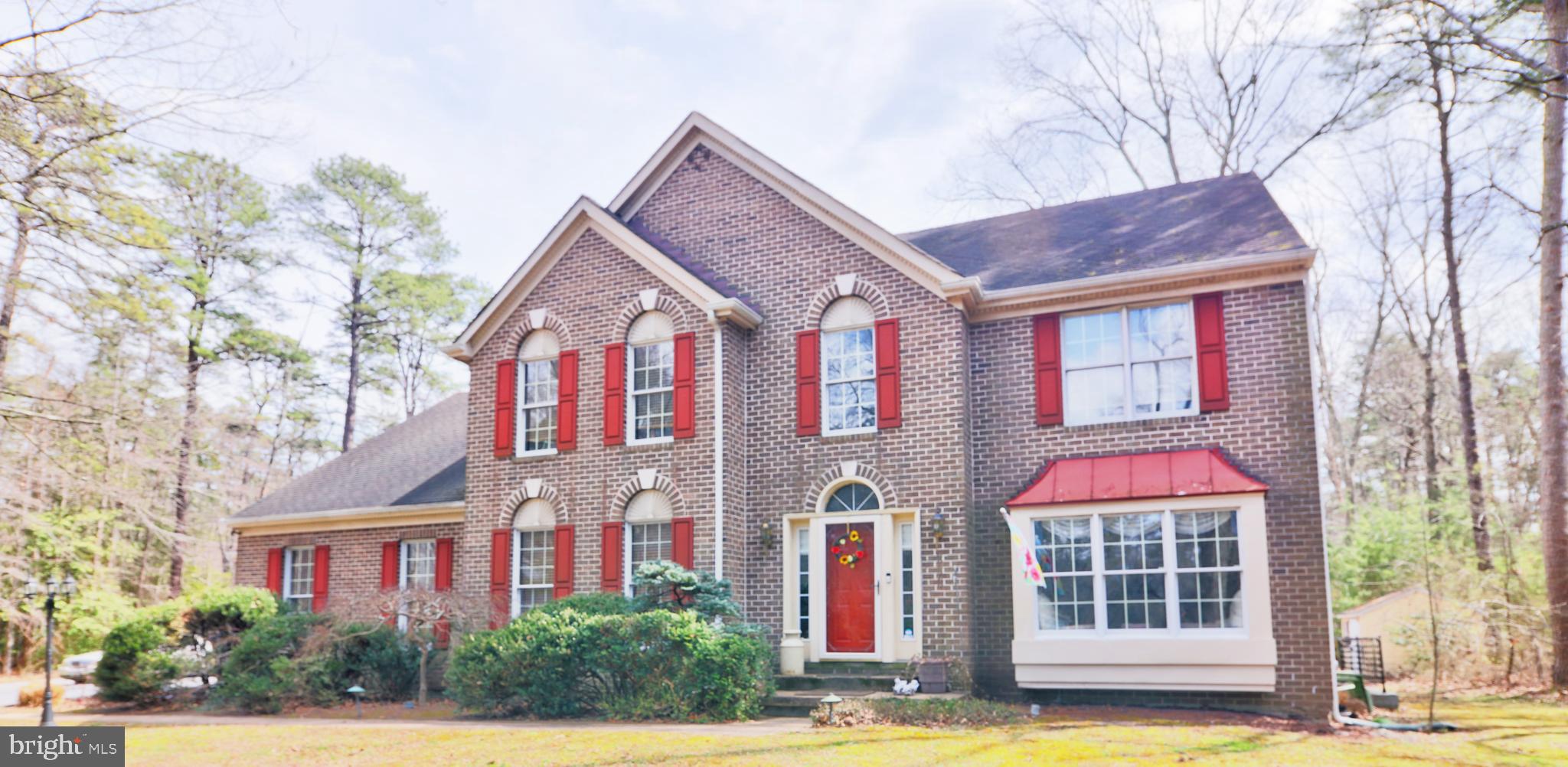 The One You’ve Been Waiting For!
This stunning brick-front colonial offers over 5,000 square feet of total finished living space, nestled on more than two private acres surrounded by serene woods. Located at the end of a private road, this exclusive property features automatic security gates flanked by elegant brick columns, ensuring privacy and sophistication. For car enthusiasts, the 30' x 40' detached garage is a dream come true, complete with a second-floor storage area, a 9,000-lb Challenger two-post car lift, an air compressor, and an updated electric subpanel to handle all your needs.
Prime Location: Situated less than half a mile from Rt. 100, this home provides easy access to shopping, dining, and major routes—perfectly positioned between Baltimore and Annapolis for ultimate convenience. Grand Interior Features:
Step through the impressive main entrance into a soaring two-story foyer with a majestic curved staircase. The main level boasts: Formal dining and living rooms for refined entertaining. Library/office for work or relaxation. Family room with vaulted ceilings and a Quadra-Fire pellet stove for cozy evenings Eat-in kitchen with center island, solid-surface countertops, and stainless steel appliances
Second Level Retreat: Luxurious owner’s suite with a spa-like super bath, walk-in closets, and a private deck Three additional spacious bedrooms Full Jack-and-Jill bath for added convenience
Incredible Lower Level: Home theater featuring an electric retractable 8' screen. Full wet bar with microwave—perfect for entertaining. Potential 5th bedroom. Additional storage space
Outdoor Paradise: Expansive rear deck with hot tub (as-is). Breathtaking in-ground pool with an oversized patio area for entertaining. Storage shed for all your outdoor needs
This one-of-a-kind property is the perfect blend of luxury, privacy, and convenience—don’t miss your chance to own this extraordinary retreat!