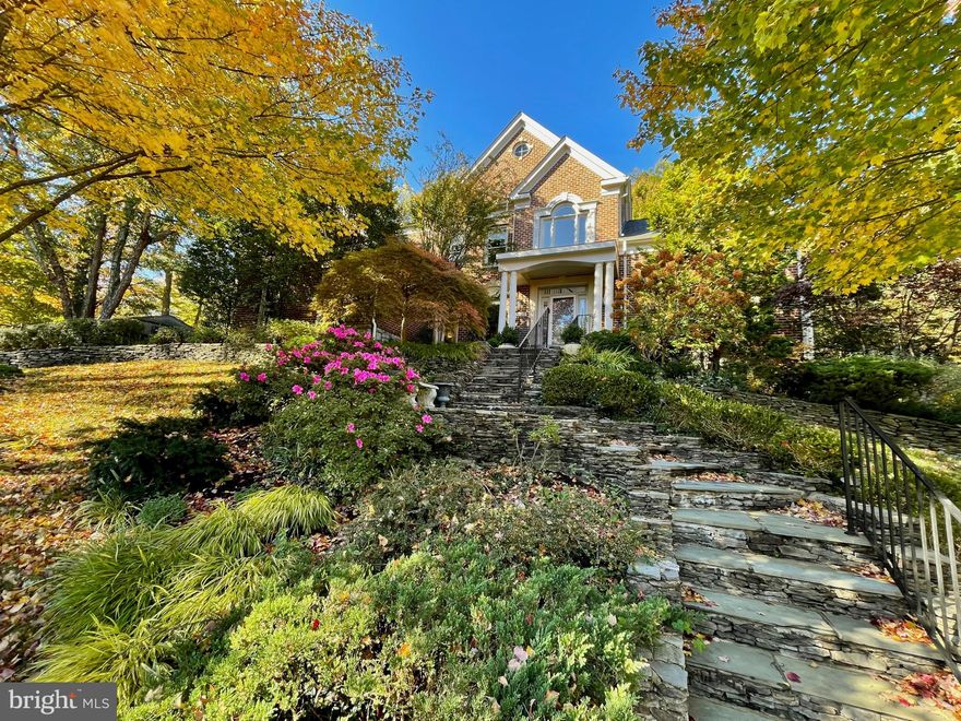 New price! Welcome to your dream home in the highly sought after Clover College Park neighborhood. Nestled on a private street exclusively owned by five high-end residences, this beautifully renovated custom home offers the utmost in privacy and tranquility in a setting rarely found in Alexandria.   You’ll appreciate the quality construction found throughout this all-brick home from the exquisite moldings and custom built-ins to the dramatic high ceilings.  The main level features an open and inviting floor plan with refinished hardwood floors throughout.  The focal point of the newly remodeled high end kitchen is the beautiful center island featuring a a six-burner Bertazzoni Range and Calcutta Sponda quartz countertops with a waterfall edge. The luxury custom cabinetry features hand selected and hand matched materials and are custom fit to maximize storage. The floor to ceiling pull out pantry is a gourmet’s delight.  Other highlights include a GE Monogram Refrigerator/freezer, Advantium wall ovens, 24 bottle wine cooler and 2 beverage coolers. For dining, there are several options: enjoy casual meals in the breakfast room, pull up a stool to the counter, or retreat to the exquisite dining room for more formal occasions.  The family room off the kitchen features coffered ceilings, custom built-ins and a two sided fireplace shared by the adjacent four season room.  Completing this level are the luxurious living room, private office with built-ins, powder room, and laundry room.   The bedroom level includes a sumptuous primary suite featuring two walk-in closets with built-ins, newly renovated bathroom with high end marble, double vanity with LED lit mirror and Bluetooth connectivity, separate jetted tub, and glass shower.  Three additional bedrooms and two full bathrooms - one of which is a Jack and Jill - complete this level.  The incredibly spacious  walk-out lower level includes a large open rec. room, two bedrooms, a den with 2 closets and windows, a full bathroom, and a storage area with built-ins.   So many options with all the space: Watch movies, shoot pool, play games, work out, work from home.  This would also make a perfect in-law or au pair suite.  Outside, enjoy the lush professionally landscaped oasis complete with mature plantings, large deck, putting green and lawn area. With a two car garage and driveway, parking is a breeze.  The location is one of Alexandria's best kept secrets. Tucked away at the top of a private street, there's no cut through traffic.  Stroll to the neighborhood pond, nearby shopping and dining, and the brand new MacArthur Elementary.  Your new home awaits!