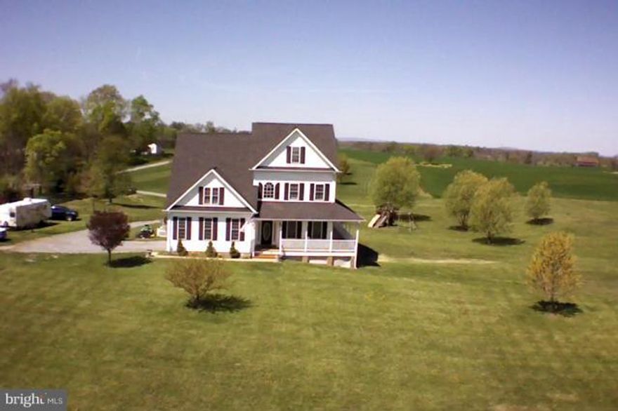 BRING AN OFFER! Fantastic move-in ready home. Upper master suite w huge closet, balcony, XXL main level deck, wrap around porch, custom cherry wood kitchen open to the family room, XXL dining room, finished 4th level ideal for homeskooling or home office, finished lower level features a wine bar, movie theater & a guest suite w/walk-in closet & full bath. ALL buyers must be qualified b4 viewing.