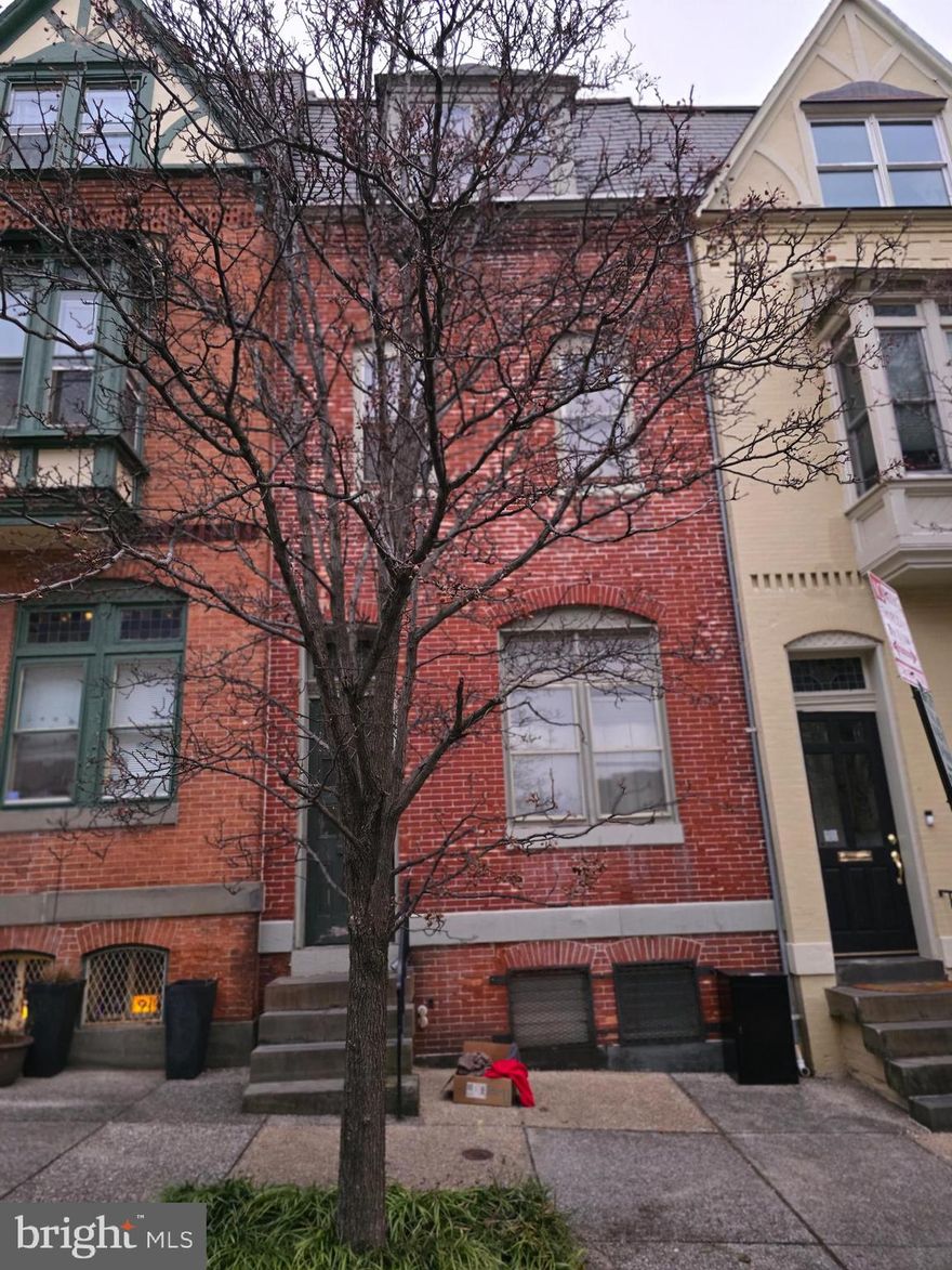 Bring your renovation and vision.  No finance contingency , prefer cash buyer. Built in 1850, this Colonial-style townhouse boasts a classic brick façade that speaks to its enduring character and charm. With a generous total finished area of 2,736 square feet, the possibilities for renovation and enhancement are boundless. This property is ripe for a major rehab, allowing savvy investors to tailor the space to meet modern demands while preserving its historical essence. Imagine transforming this interior row townhouse into a sought-after rental property or a stunning owner-occupied residence with income potential. The full, improved basement offers additional square footage that can be creatively utilized, whether for storage, laundry facilities, or even additional living space. The Bolton Hill Historic District is known for its picturesque streets and vibrant community, making it an attractive location for renters and homeowners alike. With its proximity to local amenities, cultural attractions, and public transportation options, this property is poised to benefit from the area's ongoing revitalization and growth. Investors can expect strong rental demand, driven by the neighborhood's appeal and the potential for appreciation in property values. Parking is available on the street, providing convenience for residents and guests. While the property currently does not feature a pool or extensive outdoor amenities, the lot size offers ample opportunity for landscaping or outdoor living enhancements that could further increase its value. This investment is not just about the property itself; it's about the lifestyle it offers. The Bolton Hill Historic District is a community that values history, culture, and connection, making it a desirable place to live. With the right vision and investment, this property can become a cornerstone of that community, providing both comfort and financial returns. Seize this opportunity to invest in a piece of history and create a future filled with potential. Whether you're looking to expand your portfolio or embark on a new venture, this property is a canvas waiting for your creative touch. Don't miss out on the chance to make your mark in one of the city's most cherished neighborhoods!