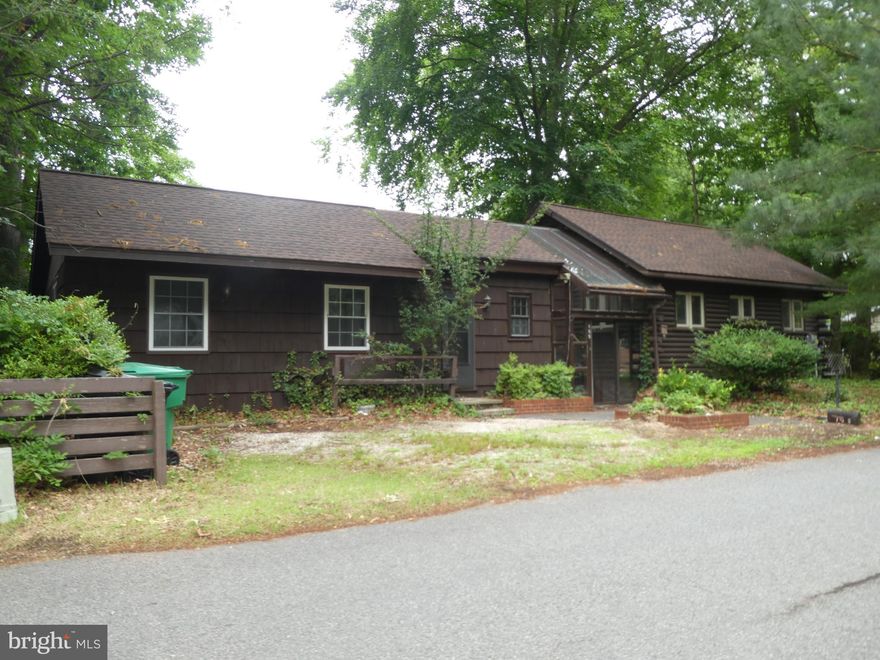 Rare opportunity for affordable lakefront living on Moore’s Lake! This charming log cabin is tucked away on a quiet dead-end street while still being conveniently located close to everything Dover has to offer. Enjoy beautiful water views from multiple decks and the enclosed porch off the primary bedroom. Perfect for nature lovers looking for a peaceful retreat. The family room features a cozy fireplace, and the walkout lower level includes a bedroom with its own full bath—ideal for guests or additional living space. Homes on Moore’s Lake at this price point are hard to find. Schedule your showing today!