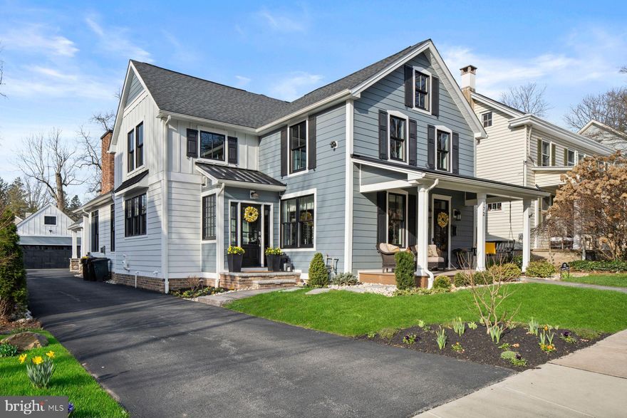 The Ultimate Doylestown Borough Modern Classic
Located in the heart of Doylestown Borough, this extraordinary 2020 rebuild stands in a class of its own. Taken down to the studs—preserving only the original basement and front façade—this home was masterfully reconstructed with exceptional craftsmanship, vision, and attention to detail. With nine variances secured to achieve its scale, layout, and amenities, this is a Borough property unlikely to ever be replicated.  A charming front porch welcomes you inside, where a refined private study anchors the entry. wide-plank engineered hardwood flooring flows throughout the main level, and the home’s historic character is honored with the beautifully preserved and restored 1870s original staircase.

The first floor opens into a spectacular open-concept living space where the gourmet kitchen seamlessly connects to the dramatic cathedral-ceiling great room. The kitchen is anchored by an oversized granite island and features a farmhouse sink, Thermador six-burner gas range, premium appliances, custom cabinetry, a spacious walk-in pantry, dry bar with beverage center, powder room, and plantation shutters throughout the first floor. The adjoining great room is highlighted by a striking floor-to-ceiling masonry gas fireplace and expansive black-framed windows and doors that flood the space with natural light, creating an inviting environment designed for gathering and everyday living.

Designed for practical Borough living, the home also offers a rare second front entrance leading directly into a beautifully finished mudroom, along with a true first-floor laundry room and abundant storage throughout.  The first-floor primary suite provides both privacy and convenience, featuring two large closets and a beautifully appointed spa-inspired bath. Upstairs, three additional bedrooms, a spacious hall bath, storage room, and large attic provide flexible space for family and guests.

Just beyond, a covered custom patio extends the home’s living space outdoors. An expanded terrace with a fully appointed outdoor kitchen and its own masonry fireplace creates the perfect setting for year-round entertaining and effortless indoor-outdoor living. Relax by the fire on the covered outdoor terrace overlooking the fenced yard. Additional features include a two-car garage with expanded storage space, a large storage area above the garage, and ample driveway parking for multiple vehicles.

All of this within walking distance to Doylestown’s acclaimed restaurants, boutiques, and cultural attractions, offering the charm of Borough living with the scale, openness, and modern amenities rarely found in town. A truly rare Borough offering—rebuilt beyond replication.