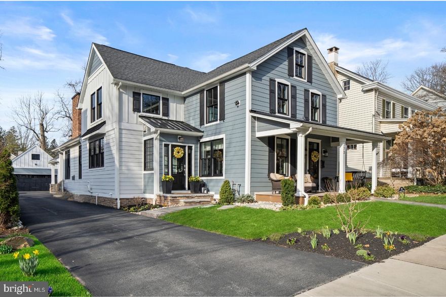 The Ultimate Doylestown Borough Modern Classic
Located in the heart of Doylestown Borough, this extraordinary 2020 rebuild stands in a class of its own. Taken down to the studs—preserving only the original basement and front façade—this home was masterfully reconstructed with exceptional craftsmanship, vision, and attention to detail. With nine variances secured to achieve its scale, layout, and amenities, this is a Borough property unlikely to ever be replicated.  A charming front porch welcomes you inside, where a refined private study anchors the entry. wide-plank engineered hardwood flooring flows throughout the main level, and the home’s historic character is honored with the beautifully preserved and restored 1870s original staircase.

The first floor opens into a spectacular open-concept living space where the gourmet kitchen seamlessly connects to the dramatic cathedral-ceiling great room. The kitchen is anchored by an oversized granite island and features a farmhouse sink, Thermador six-burner gas range, premium appliances, custom cabinetry, a spacious walk-in pantry, dry bar with beverage center, powder room, and plantation shutters throughout the first floor. The adjoining great room is highlighted by a striking floor-to-ceiling masonry gas fireplace and expansive black-framed windows and doors that flood the space with natural light, creating an inviting environment designed for gathering and everyday living.

Designed for practical Borough living, the home also offers a rare second front entrance leading directly into a beautifully finished mudroom, along with a true first-floor laundry room and abundant storage throughout.  The first-floor primary suite provides both privacy and convenience, featuring two large closets and a beautifully appointed spa-inspired bath. Upstairs, three additional bedrooms, a spacious hall bath, storage room, and large attic provide flexible space for family and guests.

Just beyond, a covered custom patio extends the home’s living space outdoors. An expanded terrace with a fully appointed outdoor kitchen and its own masonry fireplace creates the perfect setting for year-round entertaining and effortless indoor-outdoor living. Relax by the fire on the covered outdoor terrace overlooking the fenced yard. Additional features include a two-car garage with expanded storage space, a large storage area above the garage, and ample driveway parking for multiple vehicles.

All of this within walking distance to Doylestown’s acclaimed restaurants, boutiques, and cultural attractions, offering the charm of Borough living with the scale, openness, and modern amenities rarely found in town. A truly rare Borough offering—rebuilt beyond replication.