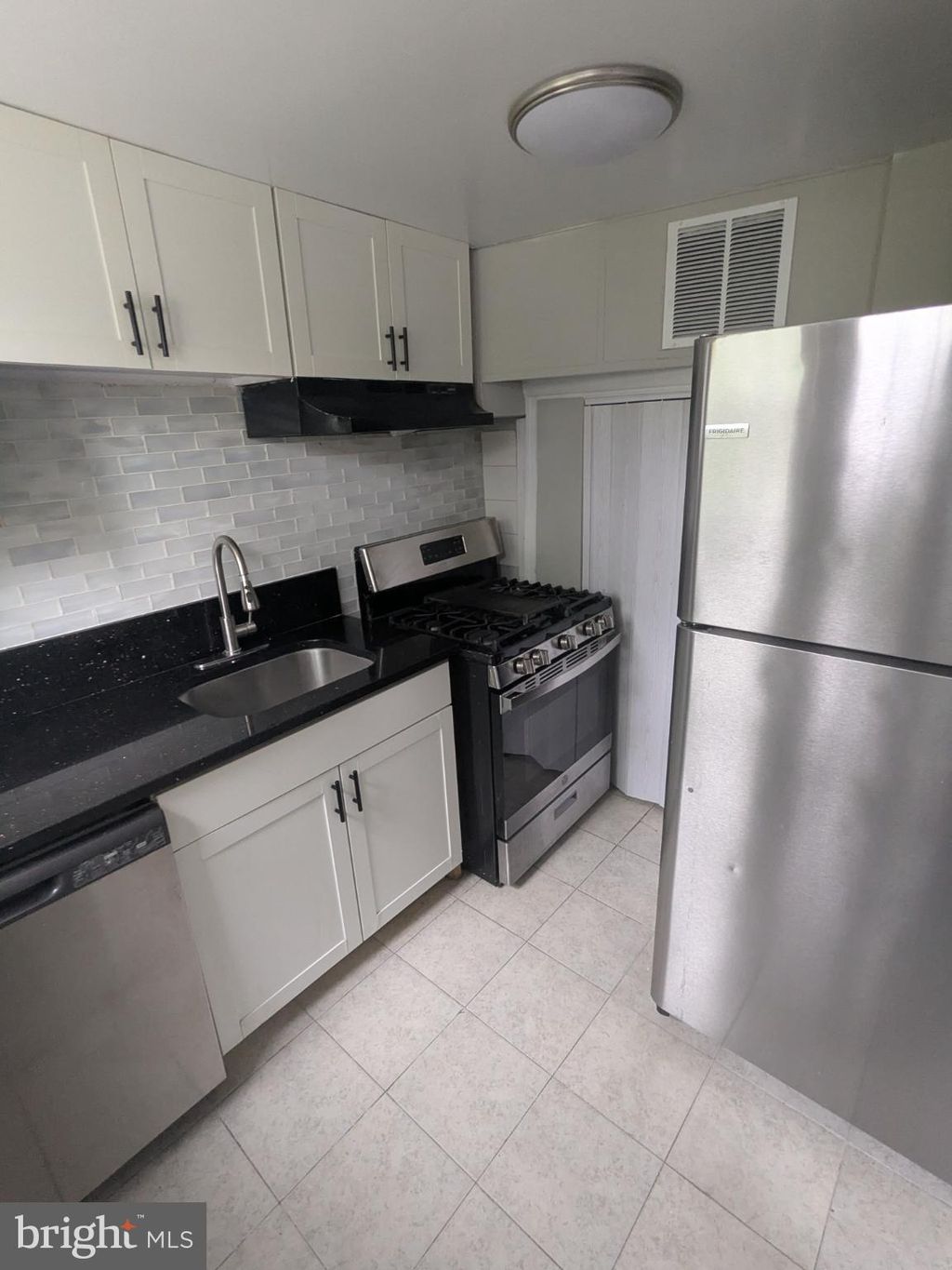 Photo of 2834 Iverson Street #101, TEMPLE HILLS, MD 20748 (MLS # MDPG2166688)