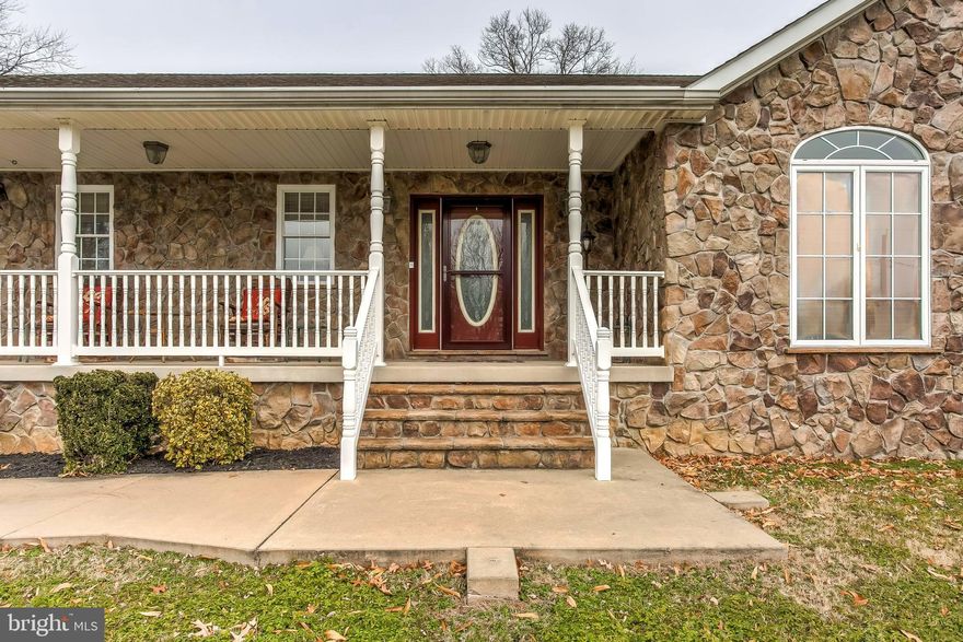 Come explore this extraordinary 3 bed/2 bath gem of a stone rancher.  Just minutes to Trade Point Atlantic,  Amazon and down the street from Young's Boat Yard.   Bring the big screen TV and the big -L- shaped couch, it will fit perfectly in this 17-21  spacious living room.  Off the living room is the master bedroom including the master bath with soaking tub for two.  Also off the living room is the 3rd bedroom currently used as an office.  And never miss a beat with the family as the living room opens to the large eat in kitchen with fabulous counter top space, breakfast bar and beautiful stainless appliances. The kitchen then opens to an expansive covered deck, that leads you to a vinyl fenced rear yard.  A perfect space for BBQ's with friends & family.  You'll love the long, recently paved  driveway that leads to a 3 car garage plus huge parking pad. Set up the workshop you've always wanted. Make an appointment today!  Open House on 1/12 has been cancelled.