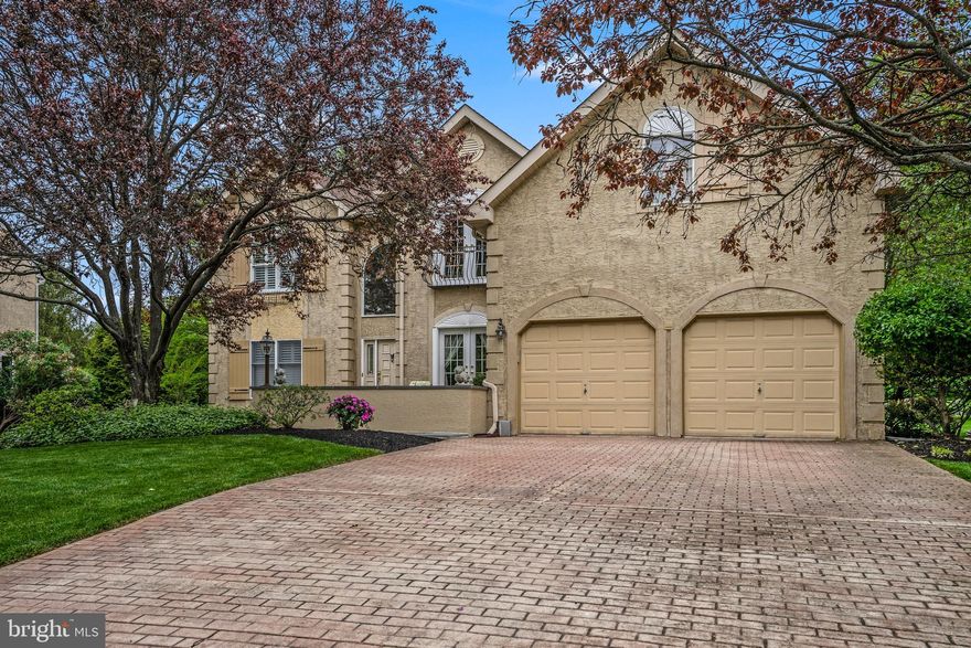 Welcome to luxury living in Blue Bell Country Club with this fabulous 4 bed, 2 full, 2 half bath home with extended two-car garage which provides for extra storage. This lovely home sits on a highly desirable premium lot within walking distance of the golf course club house overlooking the 9th hole, pond, fountain, and wedding gardens! As a resident of Blue Bell Country Club, you'll enjoy unparalleled amenities, including three outdoor pools, tennis, pickleball, and basketball courts, a playground, an array of social clubs and activities, and a low cost gym membership available ensuring a lifestyle of leisure and enjoyment. This modified Cornell Provincial with charming brick courtyard patio entry, one of the few homes in the neighborhood with this detail. Stepping inside, you're greeted by a grand two-story foyer bathed in natural light from the palladian window above. To the right of the foyer, French doors open into the home office boasting beautiful built-in shelving while another set of French doors provides convenient access to the front courtyard, seamlessly blending indoor and outdoor living. Continuing through the main level, you'll find the formal living room, where a stately brick fireplace serves as the focal point, creating a warm and inviting atmosphere for gatherings with family and friends. Plantation shutters adorn the elegant arch windows, adding a touch of Provincial charm to the space. The living room flows seamlessly into the adjacent dining room, where built-in corner cabinets provide the perfect showcase for your fine china, creating an ideal setting for intimate dinner parties or holiday gatherings. The heart of the home lies in the expansive two-story family room with rear staircase, where another brick fireplace takes center stage. Skylights overhead bathe the room in sunlight, while a built-in wet bar and wine rack add to the allure, making this the perfect space for entertaining guests or relaxing with loved ones. A doorway leads to the sunroom, a tranquil retreat flooded with natural light and offering access to the oversized rear deck with hardline gas firepit and fenced in yard, where you can barbecue with ease using the gas hookup and enjoy the picturesque views of the golf course. Off the family room, the kitchen features granite countertops, a tile backsplash, wall oven with built-in microwave above and gas cooktop on a center island and plenty of cabinet space. A breakfast area bathed in sunlight from yet another skylight provides the perfect spot for casual meals or morning coffee, while a nearby laundry room and half bath offer added convenience for daily living. Ascending the staircase to the second floor, you'll discover the luxurious primary suite, a private oasis boasting a sitting area with Juliette balcony overlooking the courtyard below. A massive walk-in closet provides ample storage space, while the ensuite bath comes complete with a stall shower, and soaking tub. Three generously sized bedrooms and a full hall bath complete the second floor, offering plenty of space for family and guests alike. Downstairs, the fully finished basement provides even more living space, with a versatile layout that includes an exercise room, craft room, fairytale playroom, areas for recreation and additional gatherings as well as another half bath which could be converted into a full bath. The property also has dual zoned HVAC for added comfort and convenience. Don't miss out on this extraordinary opportunity to become part of this friendly, active, and fun-filled community! Contact us today to schedule your private showing and experience the luxury lifestyle that awaits you at Blue Bell Country Club.