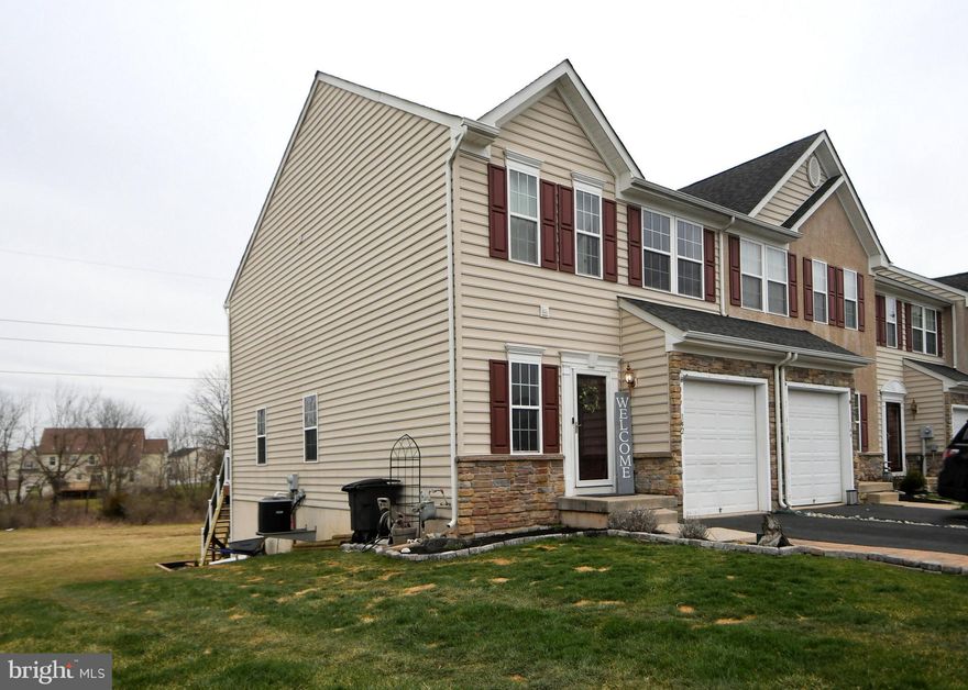 SIMPLY UNPACK! Available for December 1st Move-in Date. This GORGEOUS End-Unit in the highly sought-after Windlestrae Community has been lovingly maintained and upgraded/updated. As you enter the foyer you will notice the home has been freshly painted throughout. Luxury Vinyl Plank flooring carries through the first floor. Updated in 2018 with a quartz countertop and subway tile backsplash and updated Stainless Steel Appliances in 2020, the Kitchen overlooks the open floor plan of the family room, dining area, and morning room. The 8-foot extension at the time of original build carries throughout the basement, 1st floor, and 2nd-floor levels creating the morning room on the first floor. The morning room exits to the 2nd story recently updated Trex deck overlooking open space. The expansive deck is perfect for outdoor entertainment! Stairs allow for easy access to the rear yard and stone patio below where you can relax in your Adirondack chairs by the campfire.  The patio is also easily accessed by the expanded finished  (2019) basement that features Lifeproof Sterling Oak Luxury Vinyl Plank flooring,  a large closet for utilities and additional storage, a framed-out room with roughed-in plumbing for a full bath, and plenty of built-ins.  The second floor offers an expanded En Suite with a full bath, shower, and double sink vanity and walk-in closet, 2 generously sized bedrooms with walk-in closets, and a laundry room with a washer and dryer (2020). The 2nd-floor flooring was installed in 2021.   The home features a 1 car inside access garage. Cul-de-sac location.