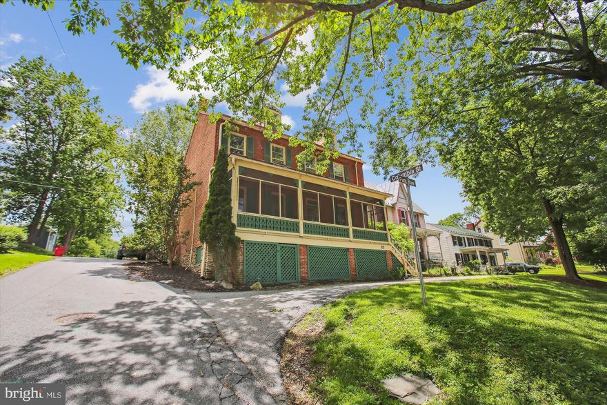 ***PRICE IMPROVEMENT!***Summer and the season for outdoor adventure is here! A myriad of adventures are right outside your front door! Your chance to own a home like this does not come along very often!  Nestled in the highly sought-after Harpers Ferry historic district on Camp Hill, this remarkable brick home offers a rare opportunity to own a piece of American history in an unbeatable location. Overlooking a charming public park, enjoy lazy afternoons people-watching from your front porch or listening to the town’s brass band perform on the 4th of July—right from your doorstep.
Originally built in 1856, this home is steeped in rich Civil War history. Legend holds it once served as officer's quarters and housed soldiers, with Civil War-era graffiti still visible on the walls. 
Inside, the home is warm and inviting, with natural light spilling across the original hardwood floors. The spacious layout includes four bedrooms and 1.5 baths, with the full bath thoughtfully updated approximately seven years ago. Period details like original wood doors and a vintage summer kitchen add character, while thoughtful updates such as a New Motor in Air Handler (2025), Central Heat and Air Conditioning with Programmable Thermostat and Wi-Fi enabled (2015), Hot Water Heater (2016), Reorganized Electrical Panel (2016) and newer stair treads combine old-world charm with peace of mind.
The living room features a striking crystal lamp with a story of its own—gifted by a family member of the previous owner, who resided in a stately Washington, D.C. home.
Below the main house, a cool and dry space offers the perfect wine cellar, as well as ample storage for kayaks, bikes, and gear.
Just steps to the Appalachian Trail (1.5 blocks away) and walking distance to dog-friendly restaurants, the river, Lower Town, and the MARC train, this location is ideal for commuters, hikers, and history lovers alike. Plus, with the Appalachian Trail Conservancy Headquarters just around the corner, you’ll be living at the symbolic halfway point of one of America’s greatest adventures.
Don’t miss your chance to own a truly unique piece of history in one of Harpers Ferry’s most treasured neighborhoods.