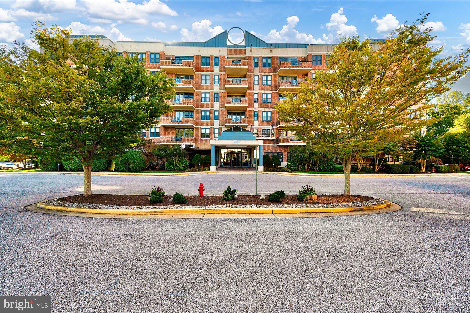 Discover easy, low maintenance living in this updated two bedroom, two bath condo nestled among the treetops of sought after Heritage Harbour, one of Annapolis’s premier 55+ communities. The home features fresh paint and new flooring throughout the main living areas, plus a remodeled kitchen with modern countertops, sleek cabinetry, and newer appliances. Major system updates include a replaced HVAC, water heater, washer, and dryer, so you can move right in and enjoy peace of mind. Relax on your private balcony surrounded by nature, or take advantage of convenient building amenities including an elevator, game room, and indoor/outdoor pools. Heritage Harbour residents enjoy resort-style amenities: a community lodge with a fitness room, billiards room, library, and gathering spaces; golf, tennis, pickleball, water access, boat storage, an additional community pool, and nearby shops and restaurants. Minutes from Downtown Annapolis and the Chesapeake Bay, this location offers comfort, convenience, and community all in one.