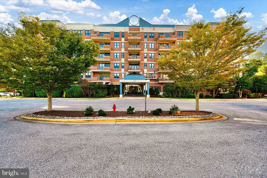 Discover easy, low maintenance living in this updated two bedroom, two bath condo nestled among the treetops of sought after Heritage Harbour, one of Annapolis’s premier 55+ communities. The home features fresh paint and new flooring throughout the main living areas, plus a remodeled kitchen with modern countertops, sleek cabinetry, and newer appliances. Major system updates include a replaced HVAC, water heater, washer, and dryer, so you can move right in and enjoy peace of mind.  Relax on your private balcony surrounded by nature, or take advantage of convenient building amenities including an elevator, game room, and indoor/outdoor pools. Heritage Harbour residents enjoy resort-style amenities: a community lodge with a fitness room, billiards room, library, and gathering spaces; golf, tennis, pickleball, water access, boat storage, an additional community pool, and nearby shops and restaurants.  Minutes from Downtown Annapolis and the Chesapeake Bay, this location offers comfort, convenience, and community all in one.