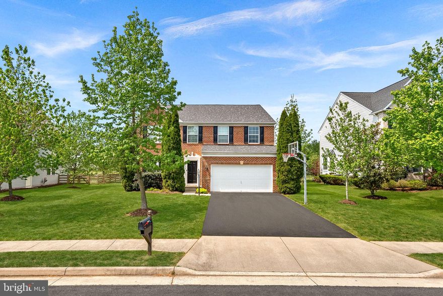 Welcome to this exquisitely updated home, ideally located in the Kirkpatrick Farms community in Aldie. Offering a unique and versatile floorplan, this home features four spacious upper-level bedrooms plus a loft area that can easily be converted into a fifth bedroom—perfect for added flexibility as your needs evolve.

Step inside to discover a bright, open layout with a grand foyer, formal living and dining rooms, and thoughtfully designed living spaces throughout. The completely remodeled kitchen is a showstopper, featuring LG stainless steel appliances, granite countertops, custom backsplash, undercabinet lighting, an oversized island, and modern finishes—flowing effortlessly into the sun-filled morning room and expansive family room, making it ideal for both everyday living and entertaining. The main level also includes a private office conveniently located off the family room, perfect for working from home or quiet study.

Upstairs, the luxurious owner’s suite offers a private retreat with a spa-like en-suite bath and two walk-in closets. A standout feature of this home is the upper-level layout, which includes a private en-suite bath in the fourth bedroom, two additional bedrooms with access to a separate hall bath, and the convenience of upper-level laundry. The flexible loft space provides endless possibilities as a secondary living area, home office, or easily converted fifth bedroom.

The finished lower level is designed for entertaining, featuring a custom wet bar and ample space for recreation and media. Additionally, you'll find a bonus room, a full bath, and a separate storage room.

Enjoy outdoor living at its finest with a beautiful, screened porch addition—perfect for relaxing evenings or hosting gatherings. Additional updates include a new roof installed in 2022 and a hot water heater replaced just three years ago, offering added peace of mind.

Residents of Kirkpatrick Farms enjoy exceptional community amenities including a beautiful clubhouse with fitness center, outdoor swimming pool with waterslide, tennis courts, tot lots, scenic ponds, and extensive recreation paths. The home is located within the Pinebrook, Willard, and Lightridge school pyramid. Just minutes from grocery stores, shopping, dining, area wineries, Dulles Airport, and the Toll Road, this home offers the perfect blend of comfort, convenience, and lifestyle.