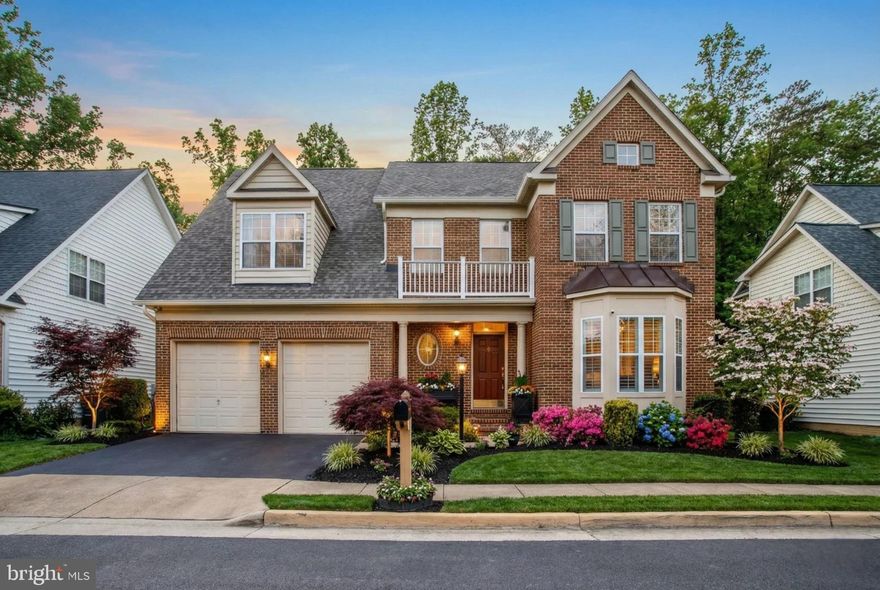 You know that feeling when you pull up and instantly think, this is the one? Between the classic brick front and charming bay window, this home has a timeless presence that feels welcoming before you even step inside. 

Once you step inside, the whole place just glows. It’s light, airy, and open, with windows everywhere so the sun literally follows you from room to room. Having hardwoods flow across the main level and all the way through the upstairs bedrooms is such a game changer—it makes the house feel high-end and cohesive, and the new light fixtures add that perfect "fresh" vibe while keeping the home warm and inviting. 

The kitchen is the heart of this home, and it shows. It was completely remodeled three years ago, so it feels current, clean, and truly move-in ready. White cabinets keep it crisp, the tile backsplash adds a beautiful layer of texture, and the waterfall granite island is the kind of centerpiece that makes people instantly picture everyday life here. Granite carries through the counters and backsplash, tying the whole space together. And the practical part buyers love: all of the appliances are only three years old, so you’re not walking into a kitchen with surprises. 

Upstairs, the home keeps delivering. The primary suite feels like a real retreat, and the renovated primary bathroom is a standout. Finished about a year ago, it feels like your own private spa. The walk-in shower is huge, wrapped in beautiful tilework, and finished with waterfall shower heads that make the whole experience feel like a reset at the end of the day. The glass enclosure keeps everything open and bright, and the updated vanities, mirrors, and lighting make the whole space feel calm and polished. Two additional full bathrooms upstairs were updated recently as well with new tile flooring and baseboards, so the entire level feels consistent and well cared for. And one of those everyday-luxury details that matters more than people realize: there’s a dedicated laundry room upstairs, right next to the bedrooms. No hauling baskets up and down stairs. It’s just easy. 

The basement is a major bonus here because it’s not just “extra space” — it’s set up to actually function like its own living area. You’ve got a full second kitchen with a full-size refrigerator, stove, and built-in microwave. Add a fully renovated basement bathroom, completed two years ago, features new floor and shower tile, a new vanity, mirror, updated fixtures and it opens up real options. Whether you’re thinking multi-generational living, a roommate setup, guests who need their own space, or just a separate hangout area for game days and movie nights, it’s ready. And the walk-up rear exit is the game changer, because it gives the basement its own easy in-and-out without everyone coming through the main level. 

Out back is where you’ll really start picturing life here. There’s a huge wood deck that’s been freshly painted, giving you that perfect spot for coffee, grilling, or hosting friends when the weather’s nice. The backyard is terraced and fenced, which is ideal for pets and kids, and that terrace setup is also perfect if you’ve ever wanted a real garden. It’s private, usable, and set up for actual living, not just looking at. 

Big-ticket updates include a roof replaced two years ago, upgraded 6-inch gutters, a freshly painted garage with both the floor and walls completed, and an HVAC system professionally serviced twice yearly under an active maintenance plan—providing peace of mind that the home has been consistently and responsibly cared for.

Set in Springfield, this home offers the perfect balance of everyday convenience and true neighborhood charm, with easy access to shopping, dining, parks, and major commuter routes. Thoughtfully updated and carefully maintained, it’s ready to enjoy from day one and offers comfort, character, and flexibility that adapt beautifully to the way you live.