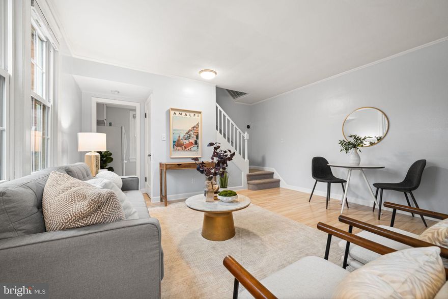 The Barton is an updated, two-level corner unit filled with natural light in the heart of Arlington Village. This 1-bedroom plus den residence offers a smart and functional layout, with a sunlit main level featuring updated flooring and a comfortable living area, with the kitchen located just off the living space. The main level also opens directly to a private deck overlooking peaceful green space. Upstairs, the spacious bedroom is complemented by a versatile den ideal for a home office, along with a full bathroom. Additional highlights include a new HVAC system (2025), an in-unit washer and dryer, and a tankless hot water heater (2024) for added efficiency. 

Arlington Village residents enjoy access to a 25-yard outdoor pool, tennis and pickleball courts, walking paths, and beautifully maintained common grounds. Just minutes from Shirlington’s dining options like Carlyle, Busboys and Poets, and Copperwood Tavern, plus shopping along Columbia Pike, Pentagon City, and nearby Metro stops including Pentagon City, Pentagon, and Crystal City, The Barton offers comfort, convenience, and an unbeatable Arlington lifestyle.