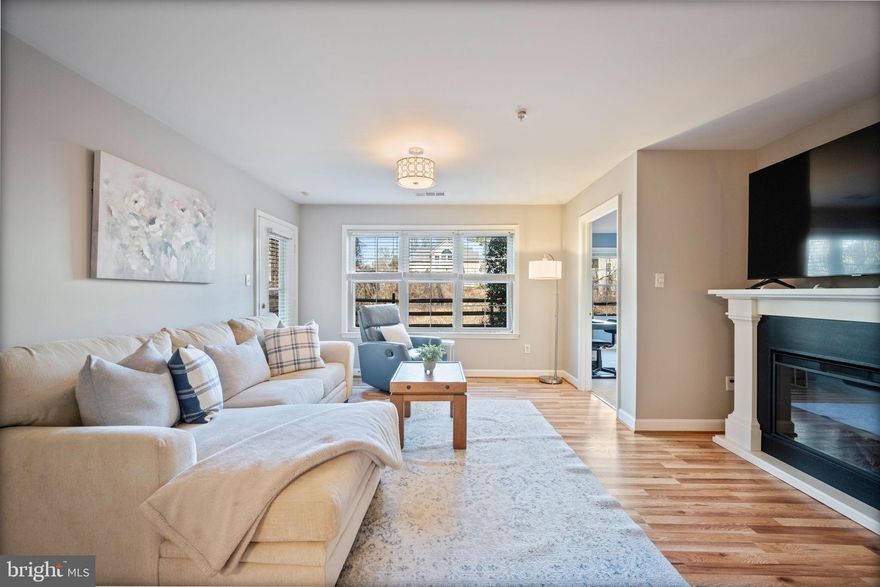 This beautiful move-in ready ground-level 2 bedroom, 2 full bath condo in the sought-after Falls Gable community features a bright and open floor plan with spacious living and dining areas with new flooring installed in 2025. The spacious updated kitchen offers beautiful countertops, stainless steel appliances including a gas range and built-in microwave, and a beautiful mosaic tile backsplash. The primary suite includes a large walk-in closet, ceiling fan, and private bath with modern wood-look tile flooring.  The guest bedroom has direct access to the renovated full bath (2019), which is also accessible from the hallway, and features wood-look tile flooring. Additional highlights include a large separate laundry room, outdoor storage closet conveniently located near the front entrance, an EV charging station nearby, and assigned parking!
Enjoy easy ground-level living with a private patio overlooking green space and a walking trail. The Falls Gable condo fee covers exterior maintenance, lawn care, snow removal, roads, and community pool, offering low-maintenance living. FHA approved and ideally located near Quarry Lake shopping center, dining, parks, and major commuter routes including I-70, I-83, and 695.