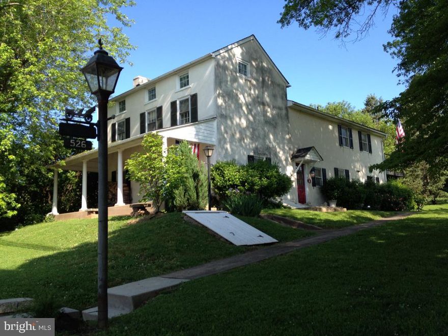 Historic 1810 Farmhouse on 2 Acres with Pool, 3-Car Garage, Studio & Subdivision Potential Near Phoenixville

Step into a rare opportunity to own a piece of Montgomery County history—enhanced by future value potential. Welcome to 526 Egypt Road, a charming circa-1810 farmhouse set on 2 picturesque acres in the highly desirable Phoenixville area.

The main level features a warm and inviting living room with original rounded windows, hardwood floors, and a wood-burning fireplace. The updated kitchen flows seamlessly into a spacious family room and a bright, year-round sunroom—ideal for both everyday living and entertaining.

Upstairs, you’ll find two bedrooms—one currently used as a home office—along with a private balcony overlooking the peaceful grounds, perfect for morning coffee or evening relaxation. The third floor, nestled within the original 1810 structure, offers an additional bedroom and full bath, providing flexible living space.

A standout feature is the detached three-car garage with a large studio above. Currently used as a home office and recording studio, this versatile space could easily be transformed into a guest suite, pool house, gym, art studio, or game room, with the potential to add a bathroom, wet bar, or kitchenette.

The outdoor setting is equally impressive, with mature trees, established landscaping, and expansive yard space. Sliding doors from the studio open onto a deck overlooking the in-ground pool—creating a perfect backdrop for entertaining or relaxing in a serene environment.

What truly sets this property apart is its documented subdivision potential. The two-acre parcel includes deeded access to a cul-de-sac connected to Cannon Hill, offering the future owner exciting possibilities to:

Build a second home
Create a multi-generational living setup
Subdivide and sell an additional lot
Hold as a long-term investment

Whether you’re drawn to its historic charm, versatile living spaces, or development potential, this property offers a unique combination of lifestyle and opportunity.

Conveniently located just minutes from downtown Phoenixville’s dining, shopping, and trail systems—while still providing privacy, space, and flexibility rarely found this close to town.