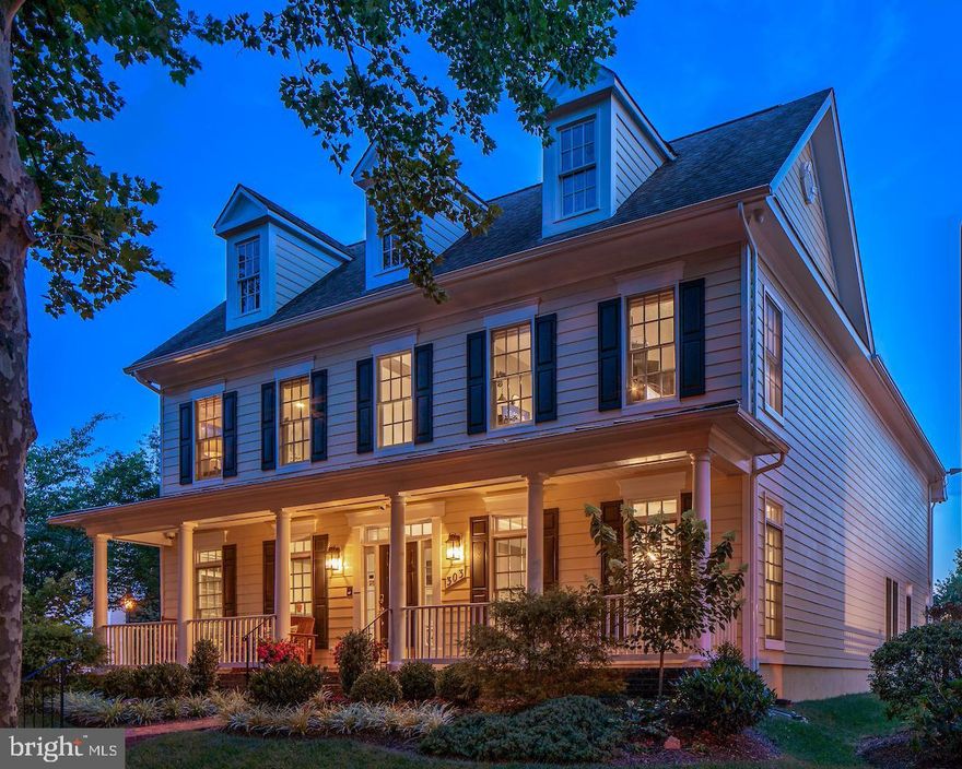 With its inviting front porch, this stunning EYA former model home beckons you onto the premium professionally landscaped corner lot with blooming trees, perennial shrubs, and flowers.  Thoughtfully renovated with stylish flare and current high "smart home" technology, the home is gorgeous, and its many system upgrades, flooring/lighting/tile/paint, stretched closets, and custom built-ins make it remarkable.  (See the attached upgrades document in the disclosures for more details.)  The "wow" factor starts as soon as you enter the foyer, where you'll appreciate the wide plank flooring, open floor plan, three gas fireplaces, and the central courtyard with a water feature and fish!  A rear patio offers another quiet place to enjoy the sun, and the rarely available balcony off the owners' suite overlooks the courtyard.
A mud room was added between the kitchen area/garage area and the laundry room was relocated to the upper level, convenient to the primary bedroom.  The two-car garage, presently tricked out as a killer gym, has a mini-split HVAC system, but the garage doors are intact, making it easy to convert back and have a conditioned space to work on cars.  There is ample street parking available for guests, and the Fallsgrove community amenities include the pool, clubhouse, walking trails, tot lots, a shopping center with a grocery store, Starbucks, and all the shops and dining one can desire.  Super close to Shady Grove Hospital, the bio-tech corridor, and I-270 for easy commuting.  Pictures only capture a glimpse of this stunning home- don't miss this immaculate, breathtaking beauty!