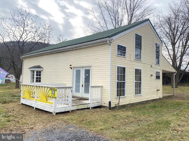 ATTRACTIVE 2-STORY HOME W/MAINTENANCE FREE VINYL SIDING, ALL NEW REPLACEMENT WINDOWS THRU OUT, METAL ROOF, COVERED REAR PORCH WITH CONCRETE FLOOR & SHINGLE ROOF, UNCOVERED FRONT PORCH WITH GLASS FRENCH ENTRANCE DOOR AND SITUATED ON .53/ACRES OF LAND. INTERIOR OFFERS KITCHEN WITH ALL APPLIANCES (INCLUDING DISHWASHER), DOUBLE BOWL S/S SINK, OAK & WHITE CABINETS, DECORATIVE CEILING LIGHT, VINYL FLOORING AND SLIDING GLASS DOOR LEADING TO REAR PORCH. SEPARATE DINING ROOM, LARGE FAMILY ROOM WITH BAY WINDOW, MASTER BEDROOM WITH FIREPLACE AND W-W CARPETING. 2ND FLOOR INCLUDES (2) BEDROOMS, 2 STORAGE ROOMS AND FULL BATH AND LAUNDRY ROOM (INCLUDES DRYER). OTHER AMENITIES: ELECTRIC BB HEAT, WINDOW AC UNIT, 62 GALLON ELECTRIC HOT WATER HEATER, CEILING FAN/LIGHTS MOVE IN READY AND ONLY MINUTES FROM TOWN. GREAT STARTER HOME WITH ROOM TO GROW. CALL FOR APPOINTMENT TO VIEW.