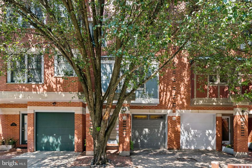 Welcome to your dream home in Washington Square West. Rarely does a house so lovingly cared for with such expansive width, and attached garage parking on a quiet secluded block come available in this prime Center City neighborhood. This beautiful townhouse was built in 1991 and has been remodeled throughout the years and particularly by the current owners. On South Quince Street, enjoyed by those in the know for its peaceful charms, you're greeted by a handsome brick and painted wood façade that opens into a spacious tiled vestibule featuring a convenient coat closet and stylish powder room and direct access to the garage. Continuing back this floor opens up to one of the most amazing cooks’ kitchens you’ll ever see in a townhouse, even while your eye wants to gaze out through the wall of glass panels and doors leading out to a private secluded urban garden awash in natural light during the day and automatic garden lights in the evening. You’ll enjoy cooking a feast utilizing the best appliances such as a four-burner Wolf cooktop with griddle, a second cooktop on the enormous island featuring granite countertops that will tempt you to start rolling out a strudel for the holidays; a Miele convection/microwave oven and second Wolf convection oven, convenient warming drawer, an oversized SubZero refrigerator/freezer. Double prep stations and sinks with garbage disposals. Beautiful custom Anigre wood cabinets featuring built-in appliance garage with roll-out drawers, all soft closing drawers, and imported Italian tile floors. Of course, all this opens to a spacious dining room replete with matching cabinetry ideal for storing, dinnerware, glassware, linens etc. There is a mounted TV hidden out of plain sight, but still convenient.

Wind down on the second-floor living room with rich hardwood floors, a gas fireplace, handsome mantle, beautiful glass shelving, a convenient wet bar, and custom lighting. There are clever custom storage drawers built in under the staircase that leads to the third floor, a convenient powder room. The second-floor primary bedroom suite features generous banks of closets, including a walk-in closet, leading into a luxurious spa-like bathroom fashioned from Vermont green slate, melt into the heated slated floors during any season, but especially during these cold winter weeks. There is a two-person shower so no delays making it to the Kimmel Center, just several blocks away.

Continuing up to the third floor you’ll find 2 bedrooms, a jack-and-jill bathroom with Jacuzzi tub, slate floors, and a den with skylight. The hall features custom built-in storage Anigre closets and cabinetry, a convenient laundry center with washer and dryer. This is the perfect house for anyone who wants urban sophistication with luxury and convenience.

The full clean basement presents tall ceilings and offers exceptional storage space with built-in storage shelves, and makes an ideal in-home gym (equipment included) and a fabulous custom climate-controlled 2000 bottle wine-cellar.

Included with the property are the new Weber grill connected to the gas line on the patio, the new patio furniture, the TV and electronics in dining room cabinetry; and the TV, filing cabinets, and freezer in the basement.