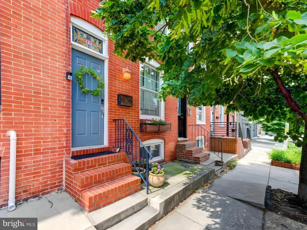 Photo of 713 S East Avenue, BALTIMORE, MD 21224 (MLS # MDBA2224212)