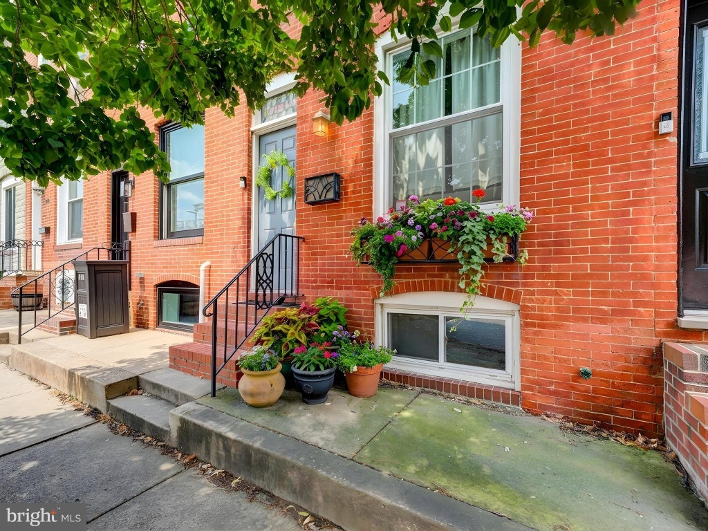 Photo of 713 S East Avenue, BALTIMORE, MD 21224 (MLS # MDBA2224212)
