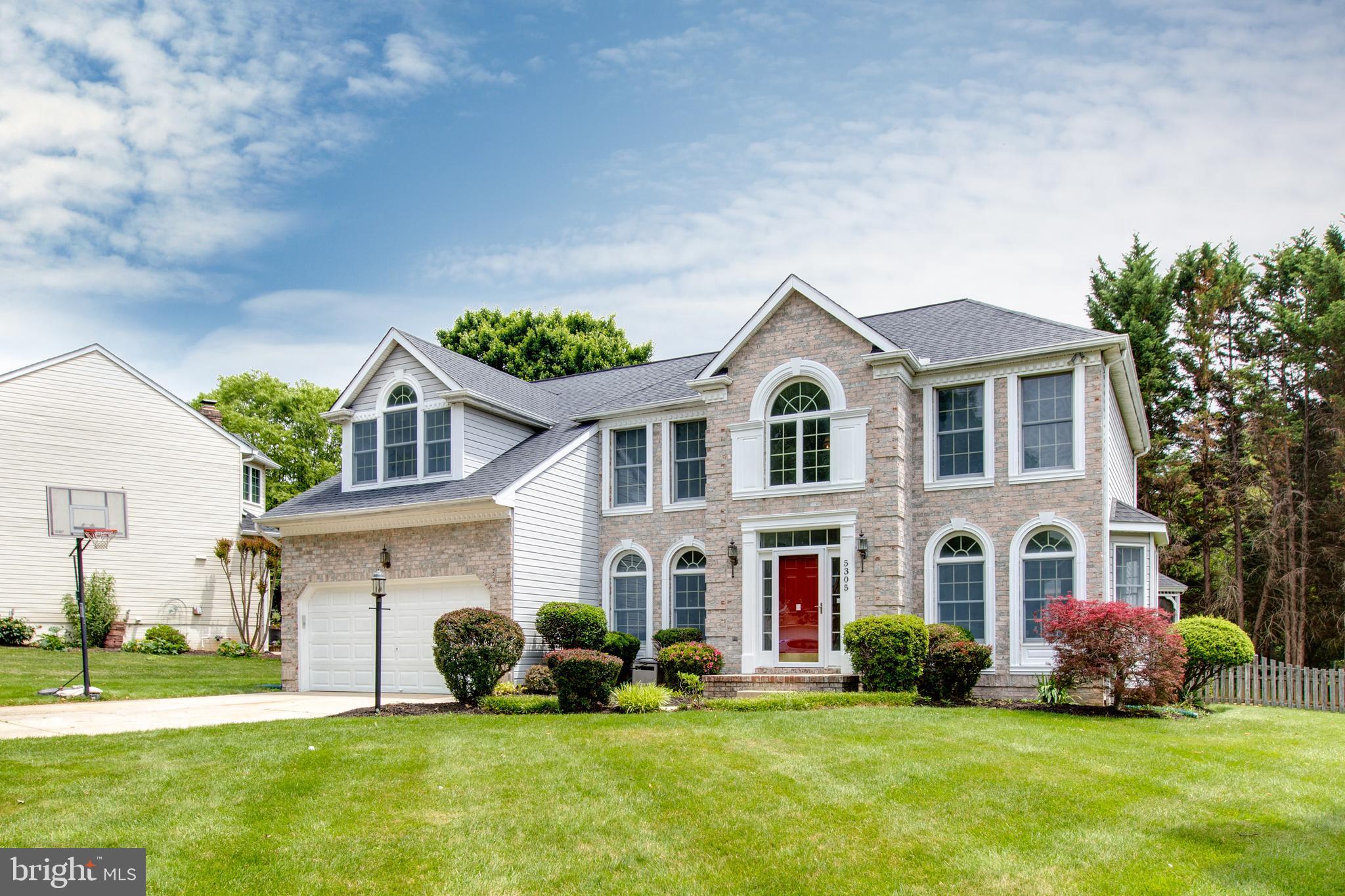 5305 TANGLE WOOD COURT