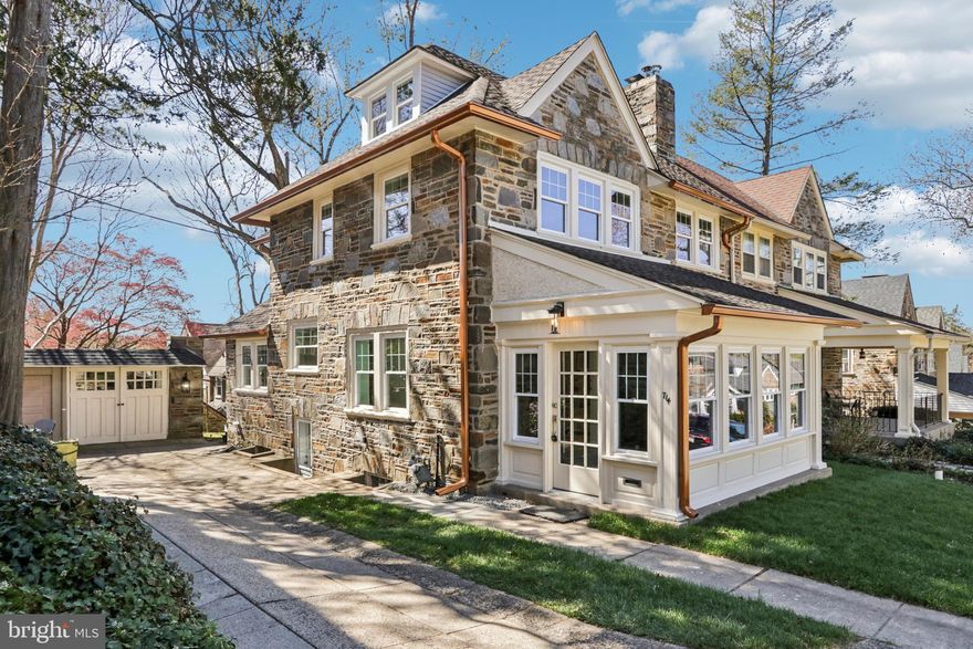Completely renovated and move-in ready, this beautifully updated stone Colonial twin in the desirable College Park neighborhood blends timeless character with elevated, design-forward finishes throughout. Originally built in 1930, the home has been thoughtfully reimagined to deliver a seamless balance of sophistication and everyday functionality.

Inside, a bright and inviting layout unfolds, featuring a central stairway with access from both the front of the home and the kitchen—enhancing flow in a way that feels both intentional and effortless. Finished on-site white oak flooring runs throughout, adding warmth and continuity, while brand new windows fill the home with natural light. The kitchen is a true standout, showcasing sleek, high-end appliances, gas cooking, and carefully curated finishes that create a clean, modern aesthetic with a refined edge. Every detail has been thoughtfully selected, giving the home a polished, cohesive feel rarely found in similar properties.

The living area is anchored by a charming fireplace, offering warmth and character while maintaining a sense of understated elegance.

The enclosed patio area has been upgraded with new bluestone slate, creating a private and inviting space ideal for relaxing or entertaining.

Additional highlights include a full basement offering flexibility for storage or future living space, a garage, and off-street parking for two vehicles. The manageable lot provides just the right amount of outdoor space without the maintenance.

Set within an established and desirable neighborhood, this home offers a unique opportunity to own a fully renovated property where classic architecture meets elevated modern living.