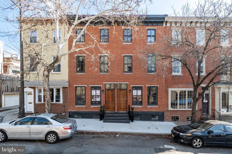 Introducing two newly developed townhomes located in the highly sought-after Fairmount | Art Museum neighborhood of Center City, Philadelphia. Spanning approximately 3,000 sq. ft., each home boasts 4-bedrooms, 3.5-bathrooms, a finished basement, and multiple outdoor spaces. Upon entering, one is greeted by a bright and airy open living space with oversized historic windows that flood the room with natural light. 10-foot ceilings, and wide plank hardwood flooring lead you directly into the dining and kitchen area. A custom fabricated kitchen plan; complete with off-white and walnut soft closing cabinetry, Bosch appliance package, Calacatta gold quartz countertops and backsplash, and polished nickel hardware. To the rear is a perfectly positioned powder room, a closet or pantry space for storage and a private and well-lit yard. Up the stairs, the second floor is where you will find two generously sized bedrooms, two full bathrooms, and a laundry area. Ascending to the third floor is home to the primary suite with a walk-in closet and extra-large en-suite bath with a standing shower and double vanity sink. A custom built wet bar with storage and a mini refrigerator separates the space between this room and the fourth bedroom. Each home is complete with an approximately 800 sq. ft. roof deck with impressive views of the City’s skyline. Additionally, these homes have a full basement with high ceilings, LED lighting, and porcelain tile floors that create tremendous versatility for a den area, children’s playroom, and fitness area. Convenience is key, as these homes are located on a beautiful tree-lined block a short distance from Whole Foods, an array of neighborhood shops, restaurants, museums, parks, and schools. Please note, a 1-year pre-paid gated parking space will be included with an acceptable offer. A newly established 10 year tax abatement will be provided upon settlement of each property.  This property benefit a 1 year full Builder's Warranty.
