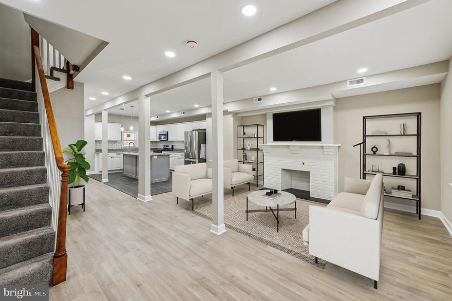 Wonderful opportunity to own this fully renovated Contemporary style 4 level townhome with 4 Bedrooms and 3 full bathrooms located in Baltimore City. This home features an open floor plan with a living room that boast a decorative fireplace, a clean and beautiful kitchen with lots of cabinets, granite countertops, a long center island with additional cabinet space, a spacious dining area off kitchen, recessed lighting and beautiful flooring throughout. There’s even a mud room off the kitchen prefect for storing your items after you park in your carport. There's a finished basement with new carpeting, a full bathroom and a walkout to the rear yard. This amazing home also features a primary suite with an en-suite bathroom. Check with your lender as this home may even qualify for Baltimore area grants. See 
Block Grant, Live Baltimore, St. Ambrose Housing Aid Center and Chenoa grants. Schedule your showing today!