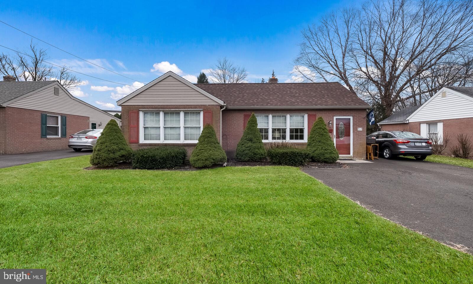 3 BR, 1.5 BA brick & vinyl sided Rancher extra wide driveway. Entryway offering hardwood floors opens to formal Living room with wall-to-wall carpet & triple window welcoming in the sunshine. Large Eat-in Kitchen with hardwood floors, oak cabinetry, granite countertops, stainless steel undermount sink, ceramic tile backsplash, pantry, built-in dishwasher & electric cerran top range. Kitchen opens to Family room with wall-to-wall carpet, corner, floor to ceiling brick hearth with propane gas fireplace, large casement window overlooking rear yard, access to powder room & door leading to brick side patio. Three nice-sized bedrooms all offer wall-to-wall carpet & ceiling fans. Full bath with ceramic tile floor & walls, pedestal sink & tub/shower combination. Large rear yard. Oil, hot water baseboard heat & central air. Newer roof. Andersen windows throughout.