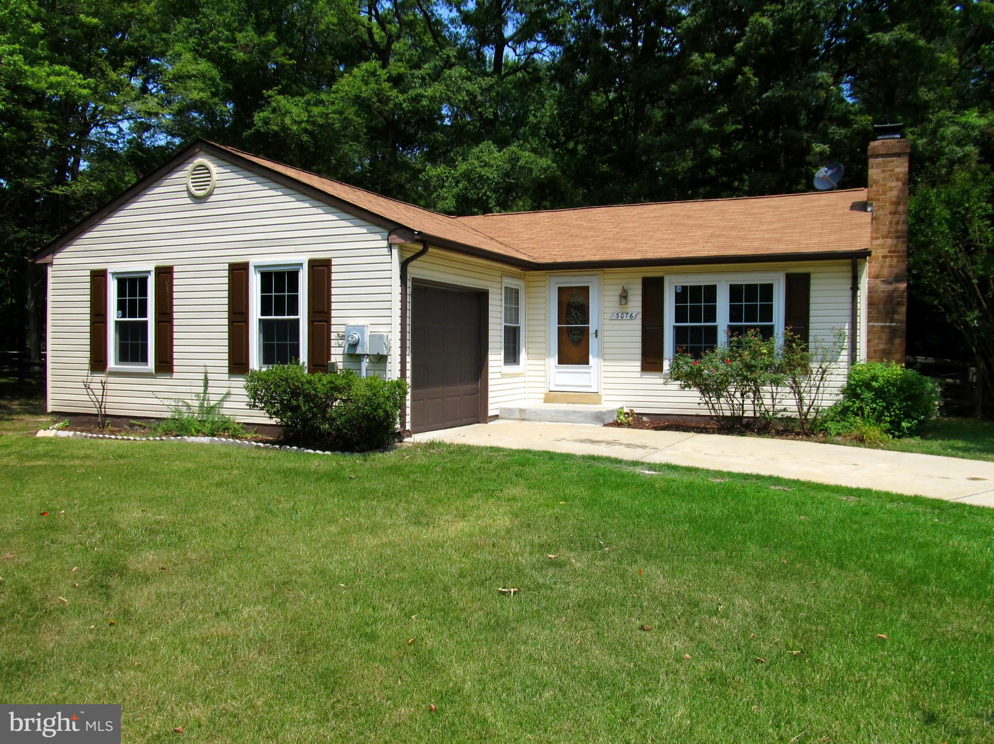 Great home for first time buyer! Living room with vaulted ceiling. Maintenance free exterior, double pane vinyl windows and vinyl siding. Fresh paint*new carpet*one car garage. Wood stove insert in fireplace for those cool fall evenings. Newer appliances include washer and dryer. Garage door opener*security system*Large fenced back yard*lg deck. Clean and move in ready.