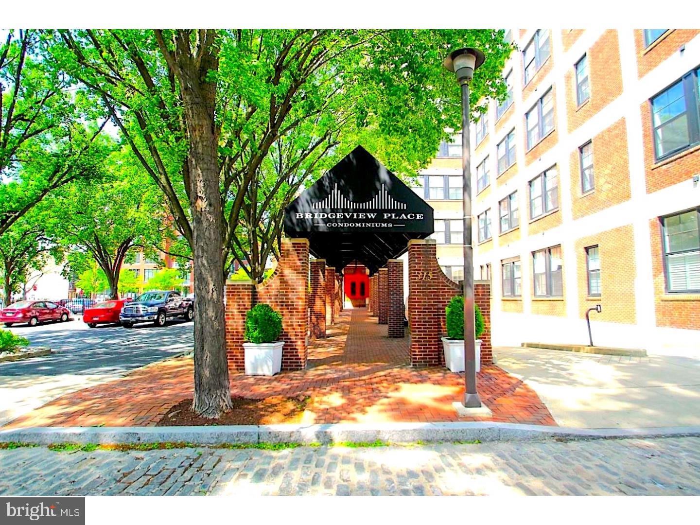 A former warehouse, Bridgeview Condominiums is now a charming building situated in the heart of Old City. The location offers great walkability to restaurants, shopping, entertainment and public transportation This fabulous 2 bedroom, 2 bath, and 1 CAR PARKING condo has been completely renovated and is move-in ready! With soaring ceilings, exposed brick and tons of natural light you will love calling it home. This unit is spacious with a large living room/dining room area and open concept kitchen. The kitchen offers beautiful white shaker cabinets accented by subway tile, granite countertops and stainless steel appliances. The dining room is accented by a great built in bar with wine fridge for easy entertaining. The master bedroom includes a gorgeous new en-suite bath Laundry is conveniently located inside the unit. Enjoy the many amenities the condo offers; 24 hour concierge, underground parking, extra storage a recently updated common roof deck offering panoramic views of the city and gorgeous courtyard. New HVAC (2018) Don't miss this one! Listing agent has ownership in the property.