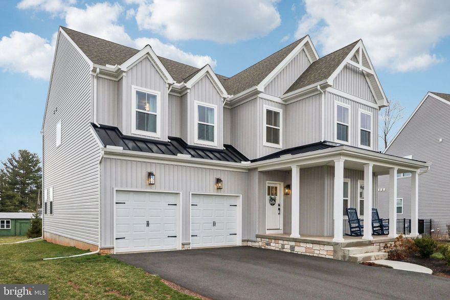 Welcome to this beautifully crafted 'Keystone Custom Homes' build in the desirable Trappe community, offering 4 bedrooms, 2.5 baths, and thoughtfully designed living spaces throughout.  A charming covered front porch invites you inside, where a bright, welcoming hallway with luxury vinyl plank flooring flows seamlessly across the entire main level. The spacious dining room features a striking linear lantern chandelier and recessed lighting—perfect for both everyday meals and entertaining.  The impressive two-story living room is filled with natural light from upper-level windows and anchored by a stunning stone gas fireplace with a wood mantle and slate hearth. The adjacent kitchen is a true showstopper, complete with quartz countertops, white shaker cabinetry, a hexagon mosaic tile backsplash, stainless steel appliances, a 5-burner gas stove, convection oven and microwave, French door refrigerator, and a large deep sink. A generous breakfast bar comfortably seats four, while the adjoining breakfast room and sunroom provide additional space to gather or unwind. A private first-floor office is bathed in natural light from expansive windows, creating an ideal space for working from home or a quiet retreat.  Entering from the garage, you'll appreciate the convenient welcome center—perfect for staying organized—along with a well-appointed powder room that completes the main level.  Upstairs, the primary suite offers a relaxing retreat with 9-foot ceilings, recessed lighting, a ceiling fan, and two very spacious walk-in closets. The luxurious en-suite bath includes a soaking tub, separate stall shower, water closet, double vanity with upgraded hardware and white shaker cabinetry. Three additional generously sized bedrooms—two with walk-in closets—a full hall bath with tub/shower combination, and a convenient upper-level laundry closet complete this level.  The unfinished basement, featuring high ceilings and an egress window, provides endless potential for future living space, a home gym, or additional storage. This exceptional home blends style, comfort, and functionality—don’t miss your opportunity to make it yours.   Ideally situated in the heart of Trappe, this home offers the perfect blend of small-town charm and everyday convenience. Enjoy close proximity to the scenic Perkiomen Trail and numerous parks, providing endless opportunities for walking, biking, and outdoor recreation, while also being just minutes from local shops, dining, and everyday essentials. With convenient access to nearby Collegeville and major roadways, and located within the highly regarded Perkiomen Valley School District, this location truly offers the best of both lifestyle and accessibility