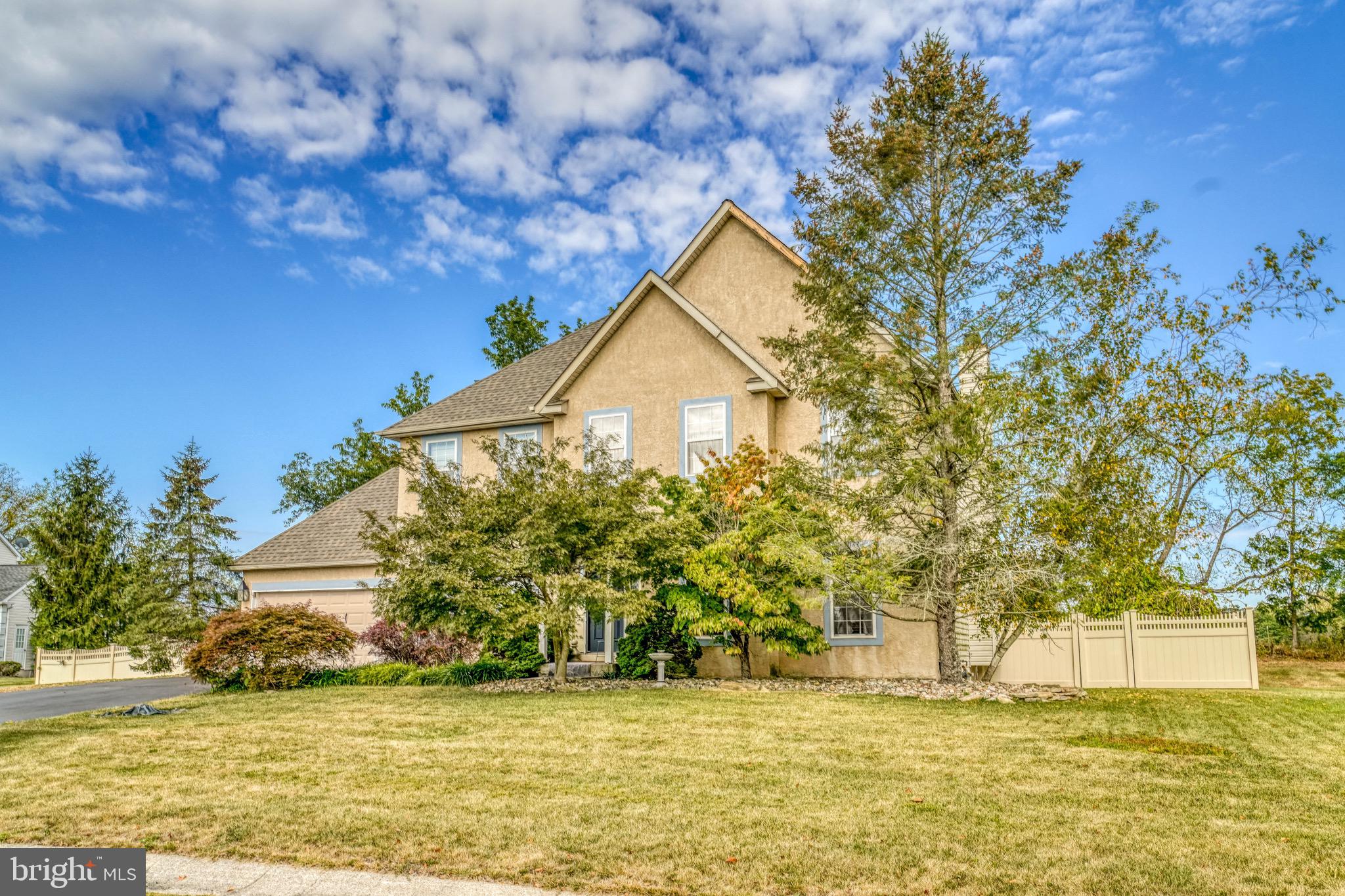 Welcome to 75 Walter Road, a spacious 4-bedroom, 2.5-bath home situated on a beautiful 0.4-acre lot in desirable Gilbertsville.. The main level features an open living room with large windows that fill the space with natural light. The kitchen provides ample cabinetry, modern appliances, and plenty of counter space, opening to a dining area perfect for family meals or entertaining guests. A convenient half bath and additional living space complete the first floor. Upstairs, you’ll find four generously sized bedrooms, including a primary suite with its own private bathroom. An additional full bath serves the remaining bedrooms, offering comfort and functionality for the whole household. The finished lower level adds even more versatility—ideal for a family room or gym. Step outside to a large fenced-in yard, perfect for outdoor entertaining, gardening, or simply relaxing in your own private retreat. The property also offers a driveway and exterior that enhances its curb appeal. *Some photos are virtually decluttered to show the full potential of each room.