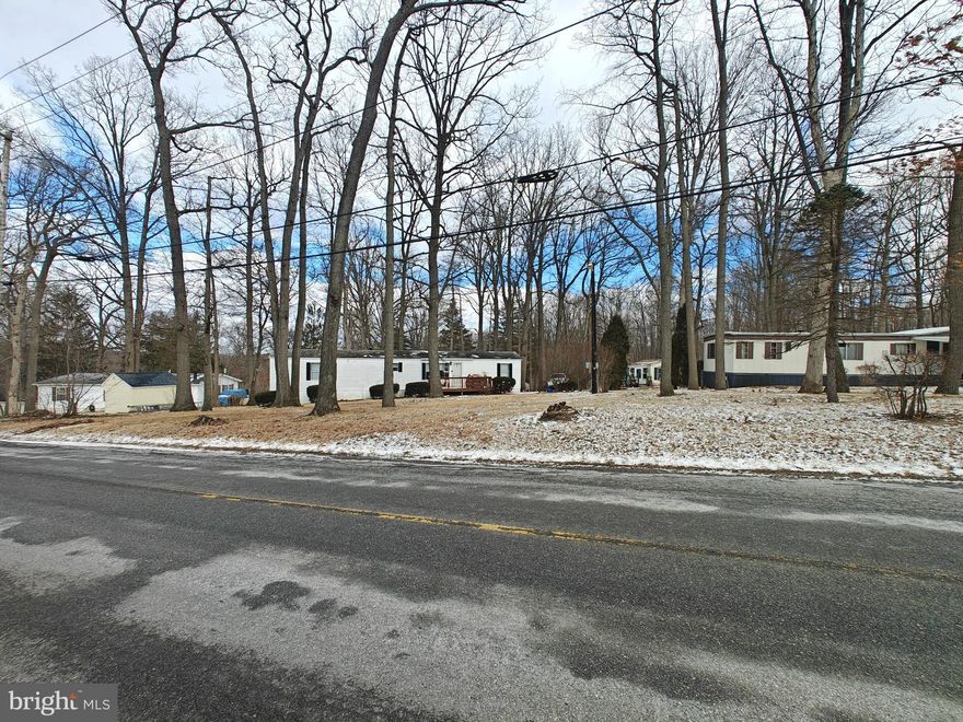 This property is going to onsite auction 4/9/2025 at 4:00 PM and is being sold with reserve. LISTED PRICE IS ONLY A SUGGESTED OPENING BID AND IS NOT INDICATIVE OF THE FINAL SALES PRICE WHICH WILL BE BY SELLER CONFIRMATION DAY OF AUCTION.  Terms: Down payment of $50,000 required day of auction. Settlement on or before June 2, 2025. Transfer taxes to be paid by buyer. Real Estate taxes shall be prorated.
Investment Opportunity! Income-Producing Mobile Home Park....– Secure your stake in a lucrative rental
market with 14 occupied sites + 1 vacant pad primed for expansion. - --Turnkey Revenue Stream – One mobile home owned & rented by
seller, adding extra cash flow.-----Private Utilities – Independent on-site well & sewer system, reducing overhead and municipal dependency.
-----Paved Driveway & Established Infrastructure – Well-maintained, easy access for tenants & future improvements.-------High-Demand Area
– Strong rental history, minimal vacancy, and room for increased returns.------Opportunity to develop, reposition, or optimize rent structures for even greater ROI.