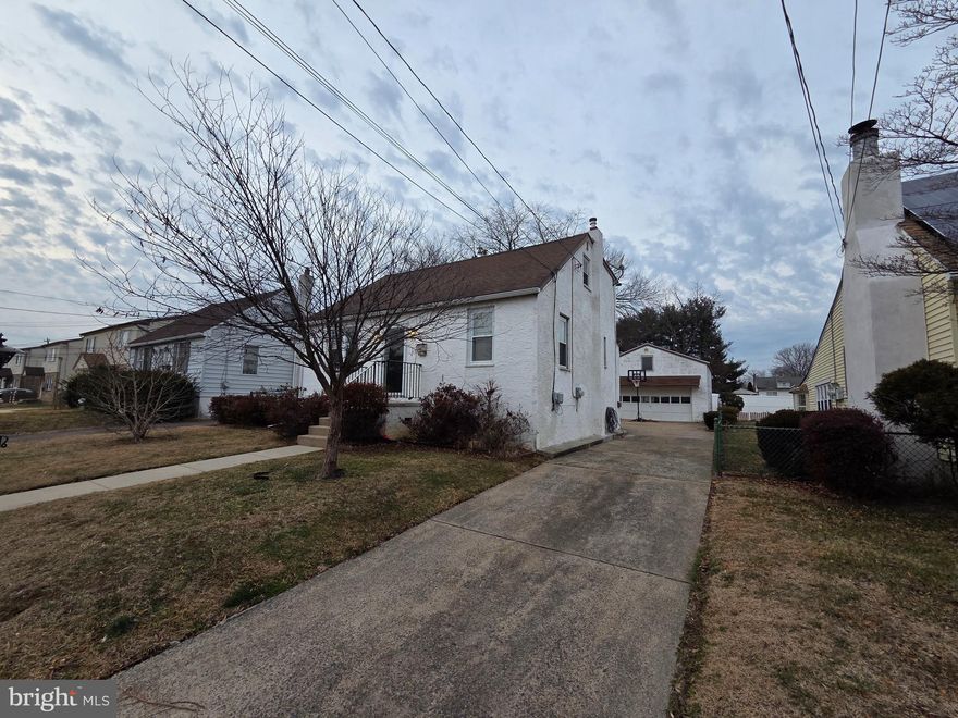 Available immediately is a rare single in Briarcliffe section of Glenolden/Darby Township. This adorable cape cod style home features updates throughout with the bonus of a PRIVATE driveway for multiple cars AND an oversized 2 car garage PLUS a level yard. Inside the main floor features a formal living room, dining room, and updated kitchen with mudroom off the  back with rear exit. Completing the main level is your primary bedroom with an en suite bath. The 2nd floor features a hall bath flanked by 2 generous bedrooms (it is a low ceiling approximately 6'). The basement allows for additional living space with a finished family room section, as well as an unfinished area for storage, laundry, a convenient half bath, and outside exit to bilco door. NO SMOKING. Pets case-by-case with additional deposit and/or rent.