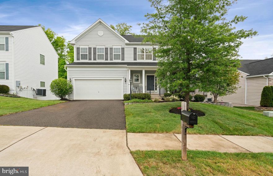 Great opportunity for One Lucky Buyer to live in Eagles Pointe West with a yard that backs to trees! Over 3700 sq ft - 5 bedrooms; 3 1/2 baths, this beautifully maintained home is ready for you to move right in. This Khovnanian home was a former spec home, Hancock III, built in 2018 with a morning room bump out and extra space in the basement below. Owners just repainted the entire main level and upstairs along with extra plush Shaw carpet main and upstairs, all windows professionally cleaned inside and out; New hot water tank installed 2026, New light fixtures in bathrooms, Front lamp post upgraded, New ceiling fan family room. ***Enjoy your view from the extra wide front porch that is perfect under cover on rainy days -- ( the landscaping with new sod has just all been taken care of as well!) The morning room and open concept living from kitchen to family room is also hugely desirable for many for entertiaing.... The Primary Suite is very spacious with 2 designated walk in closets and is attached to the primary bath w dual sinks and separate tub and shower. Upstairs laundry outside of primary in a separate room.  3 other large bedrooms upstairs as well. The basement will take you by surprise with how large and open it is - in addition to a 5th bedroom and full bath- Plenty of space for gaming, working out, etc.

Enjoy the community of Eagles Point and the amenities it offers including fitness center, swimming pool, tennis courts, and more. Conveniently located toRt 95,  shopping, restaurants and multiple commuting options including the VRE, nearby Omniride bus stops, and commuter lots.

Visit the open Fri 5-7; Sat 11-1:30 and Sunday 12-1:30. 3D Tour and floorpans also available online or reach out. Set appointments now, you won't want to miss this one!!